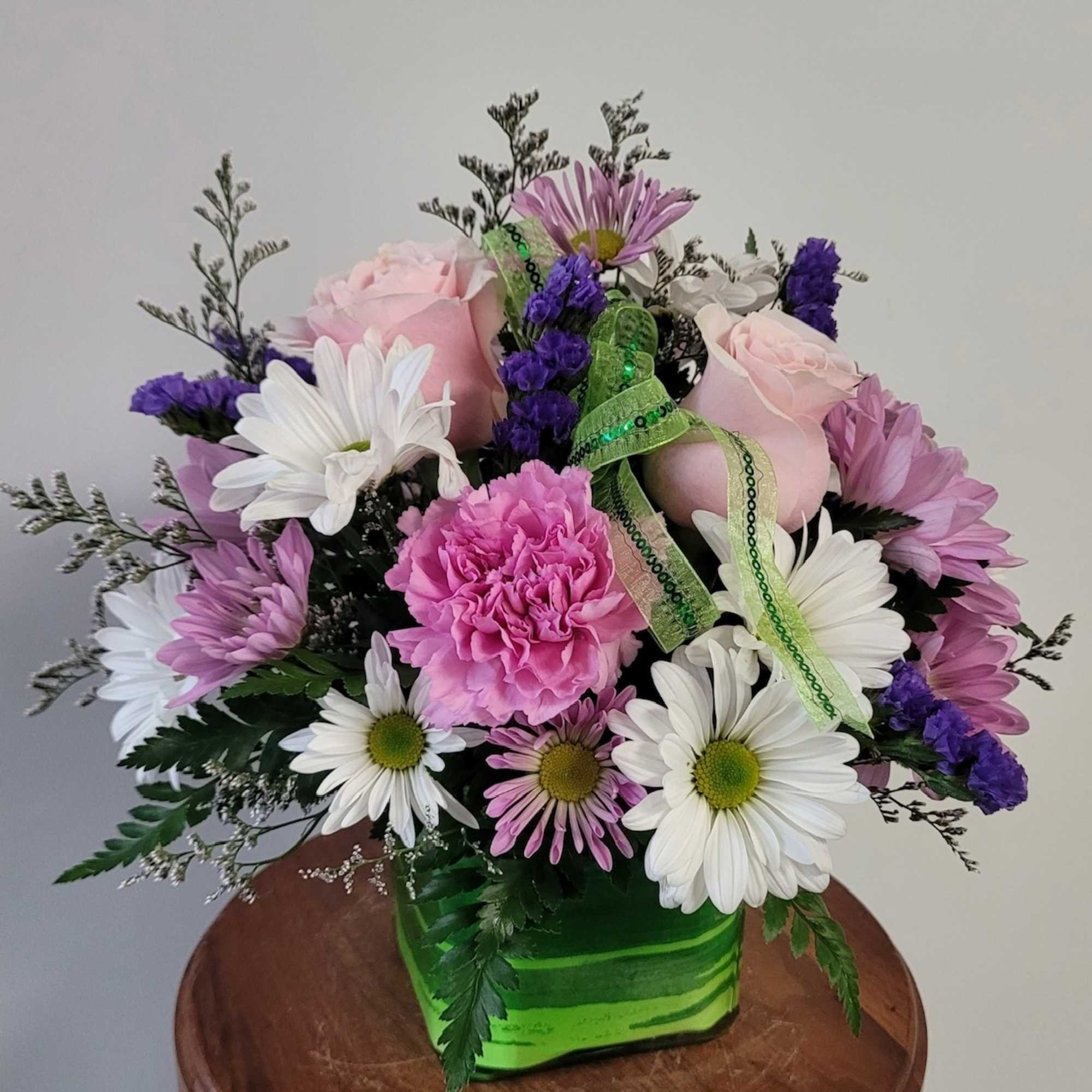 Cube filled with a bright mix of summer flowers! Cube color and