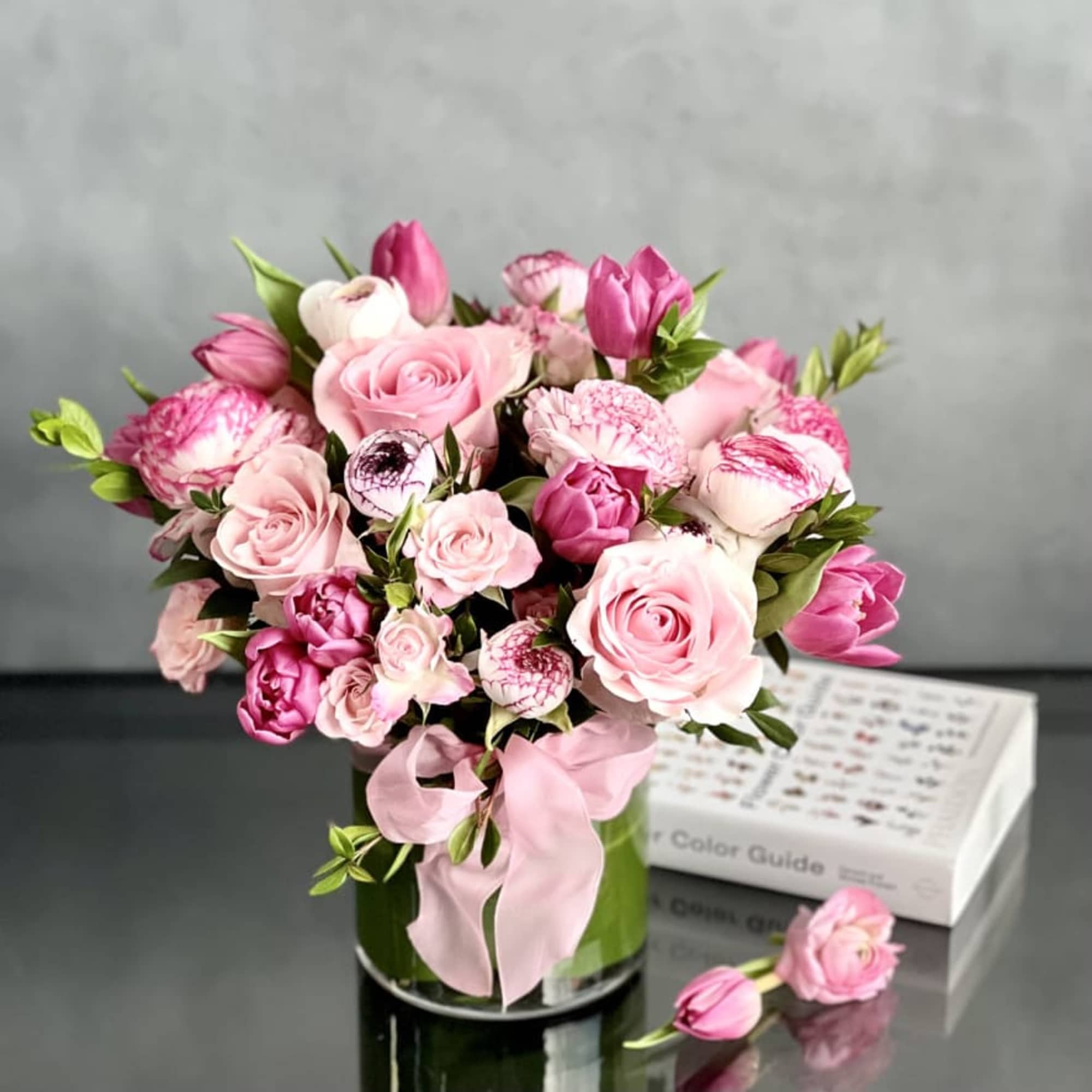 A stunning blend of pinks, creams, and touches of greens are combined