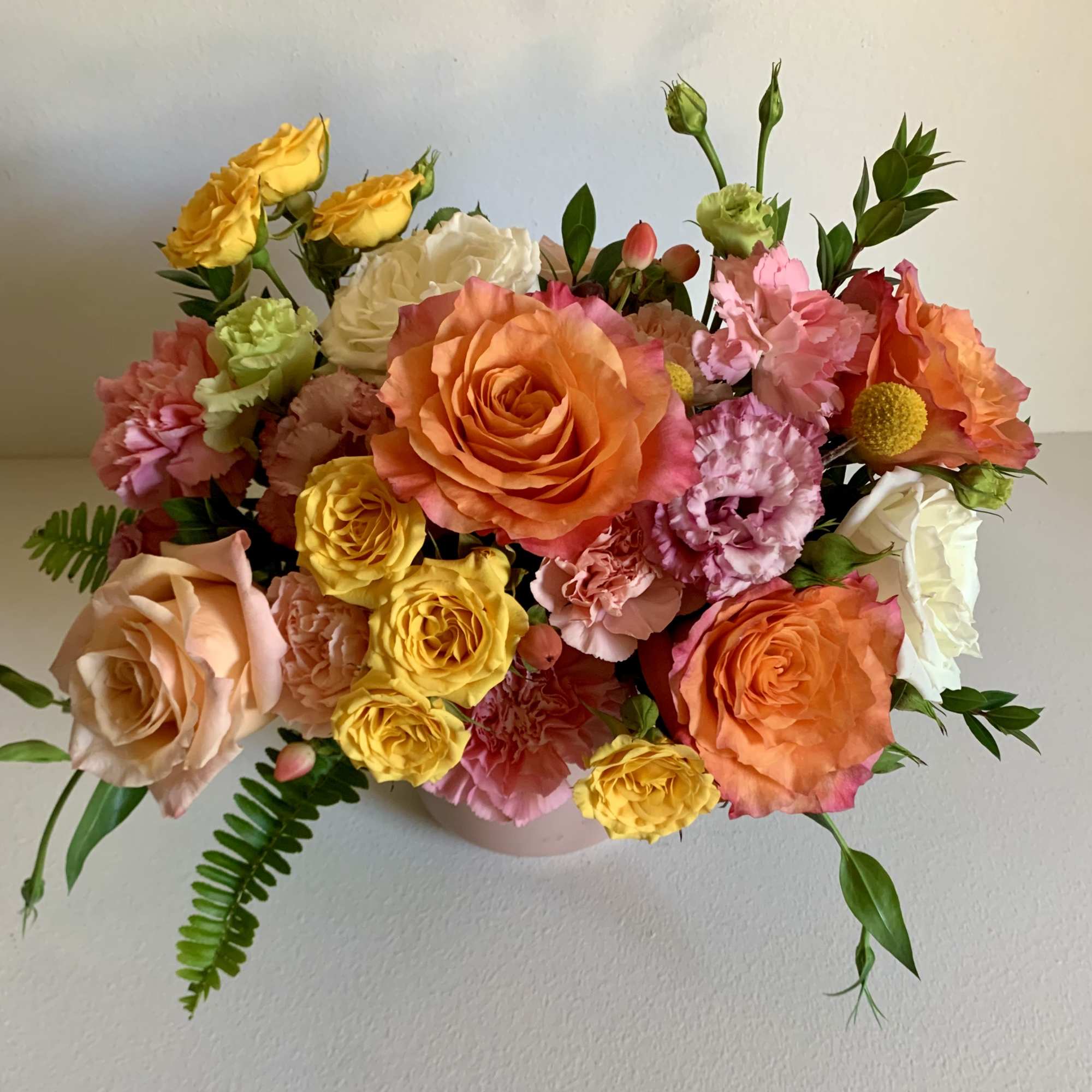 This arrangment is basically screaming happiness and joy.  Designed with shimmer