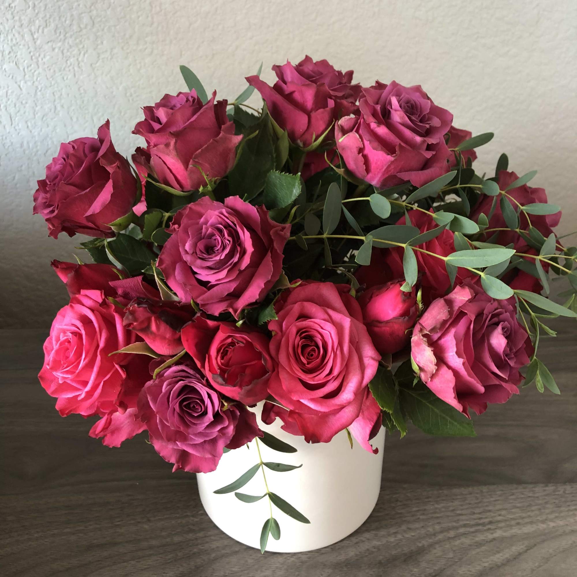 All pink roses with eucalyptus. Short design. 