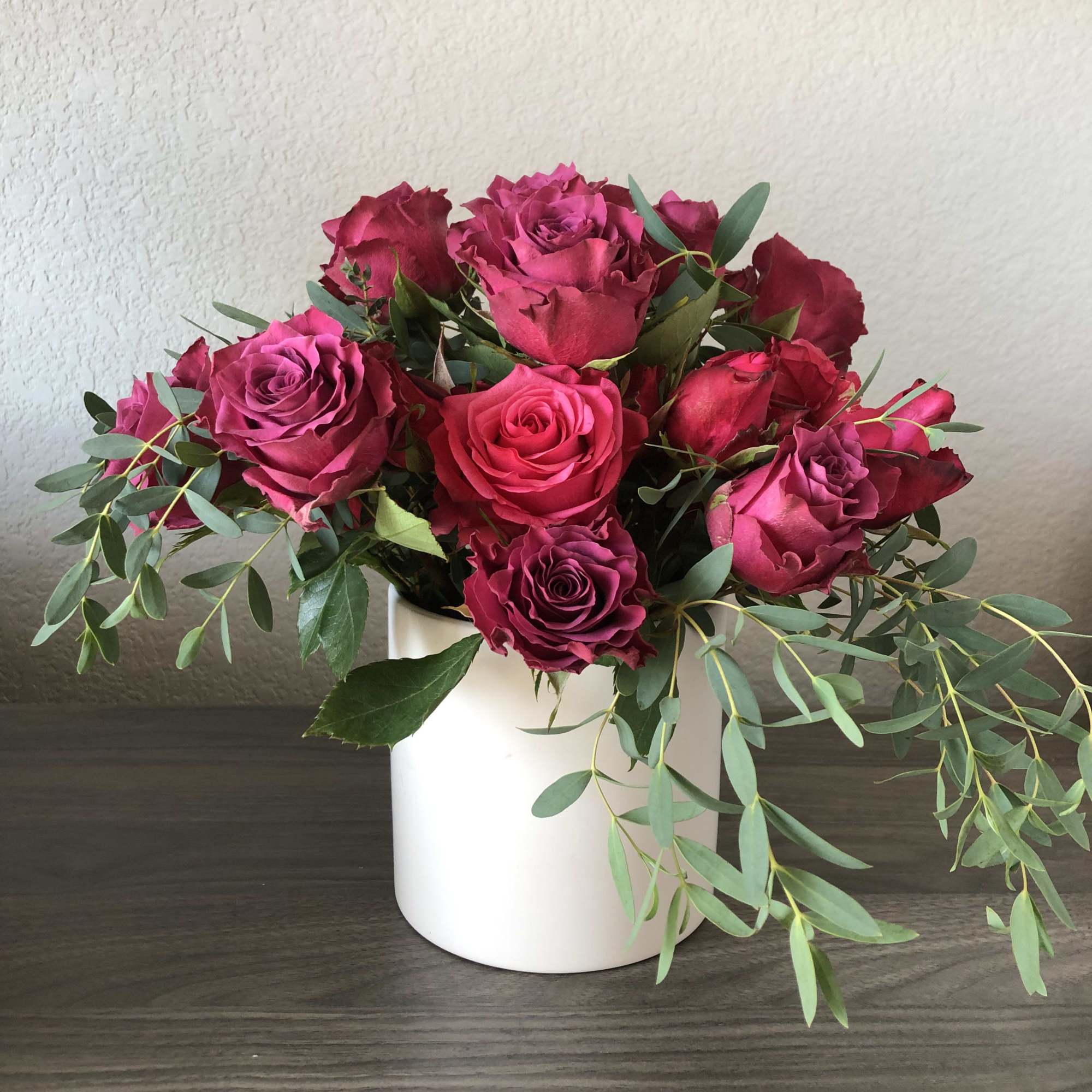 All pink roses with eucalyptus. Short design. 