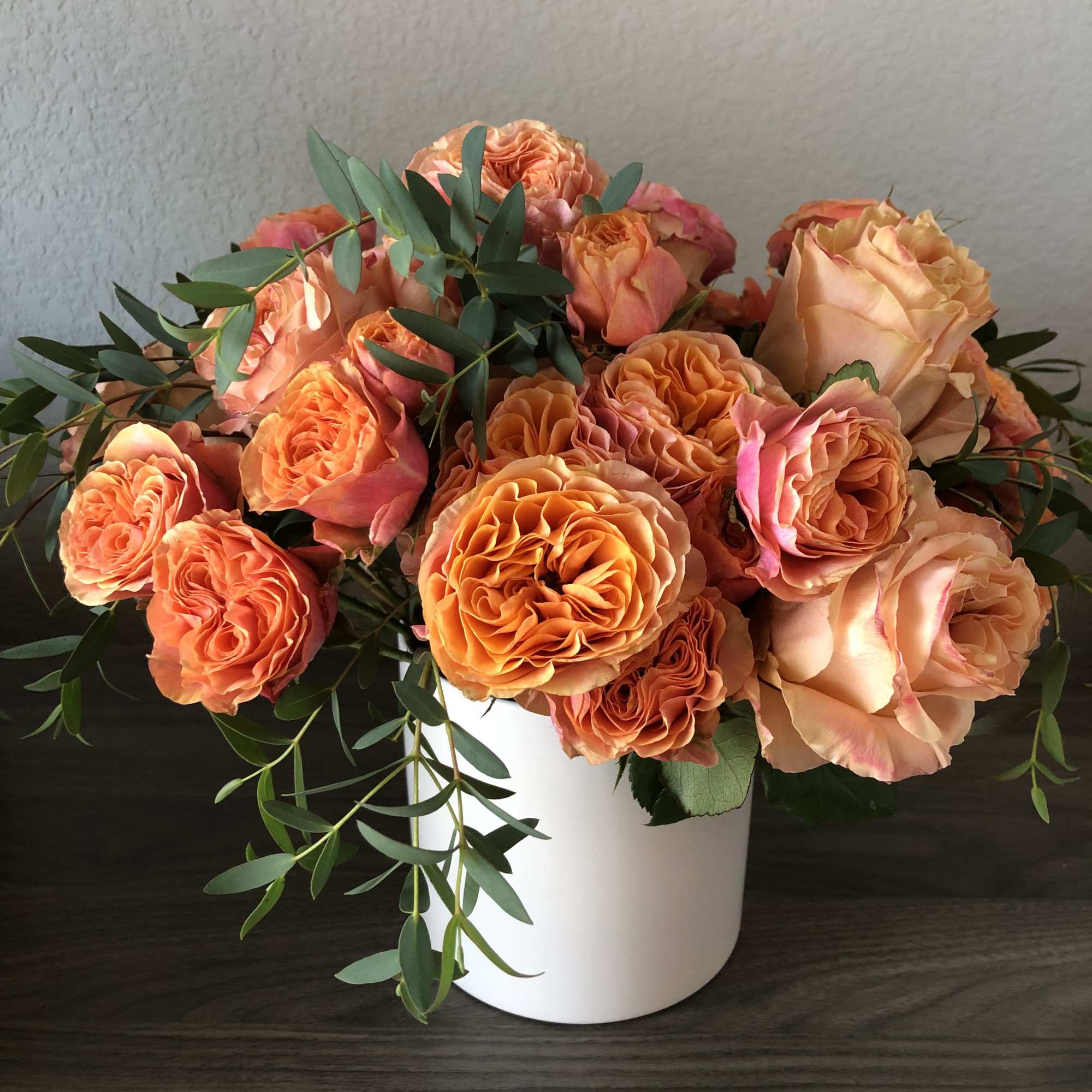 Stunning orange garden style roses.