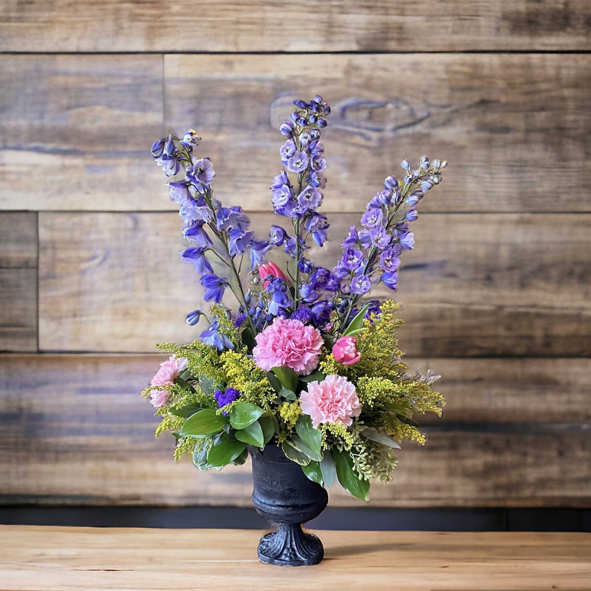 Steal the show with this beautiful arrangement! Select from blue  delphinium