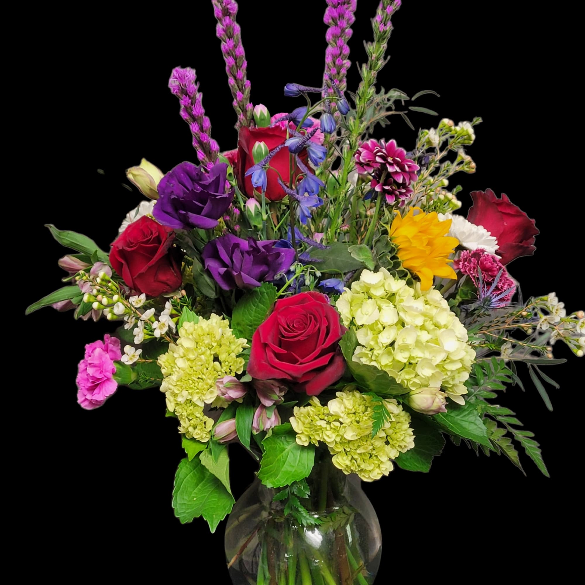 Mixed arrangement of hydrangea roses, liatris ,Daisy&#039;s, Alstroemeria carnations, and delphinium it&#039;s