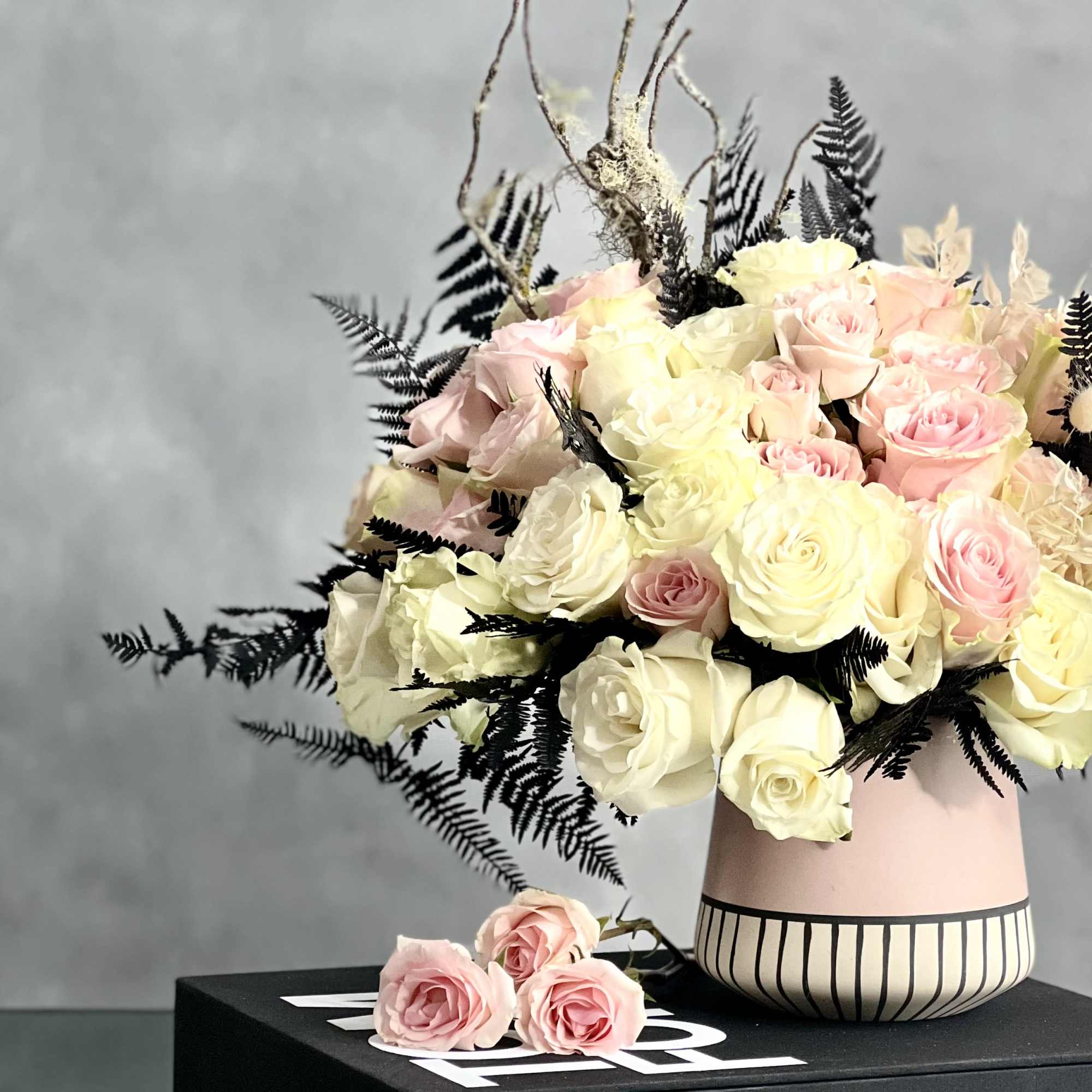 A unique fall floral mix expressed elegantly with neutral tones and splashes