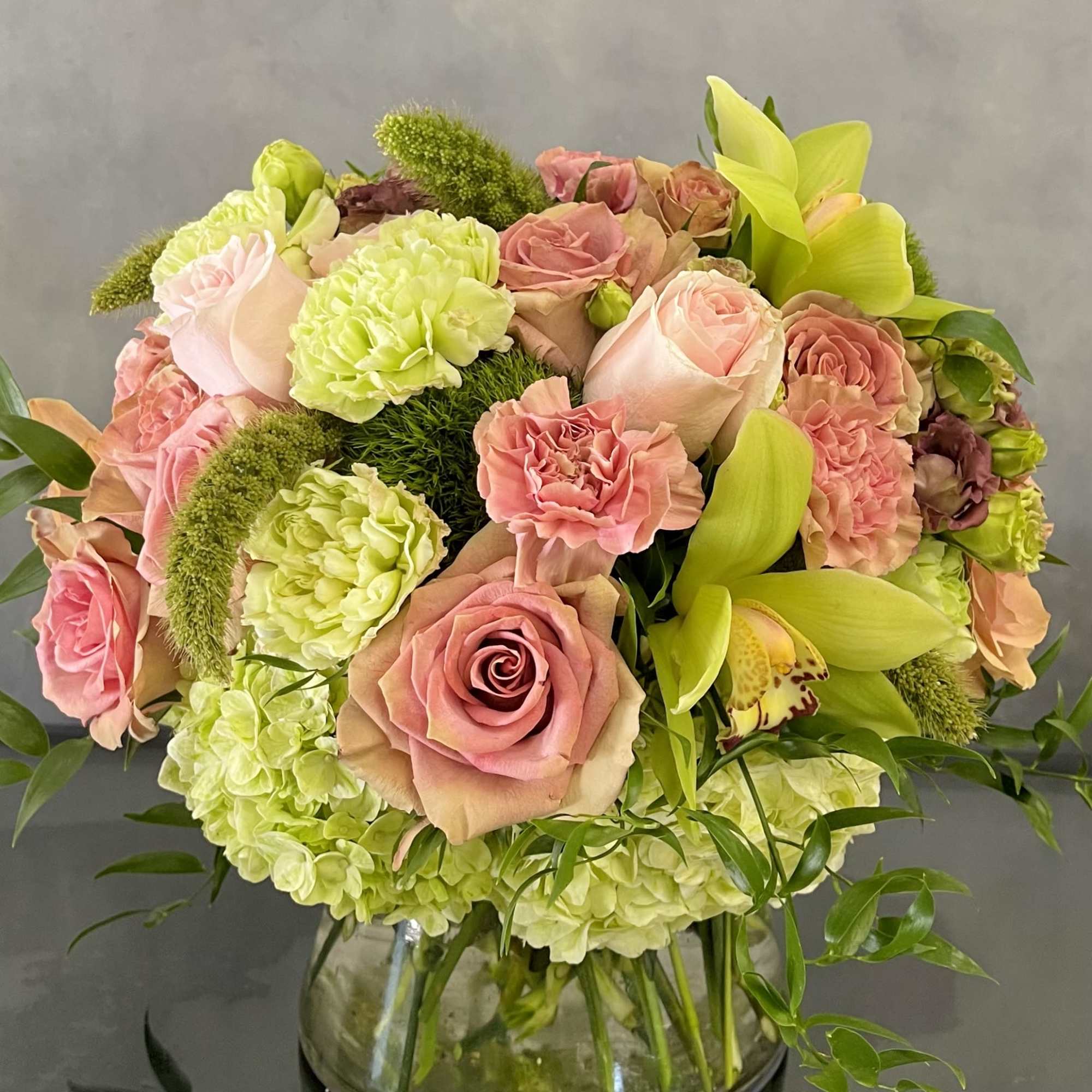 A mini version of a pink Rose Garden. This arrangement consists of