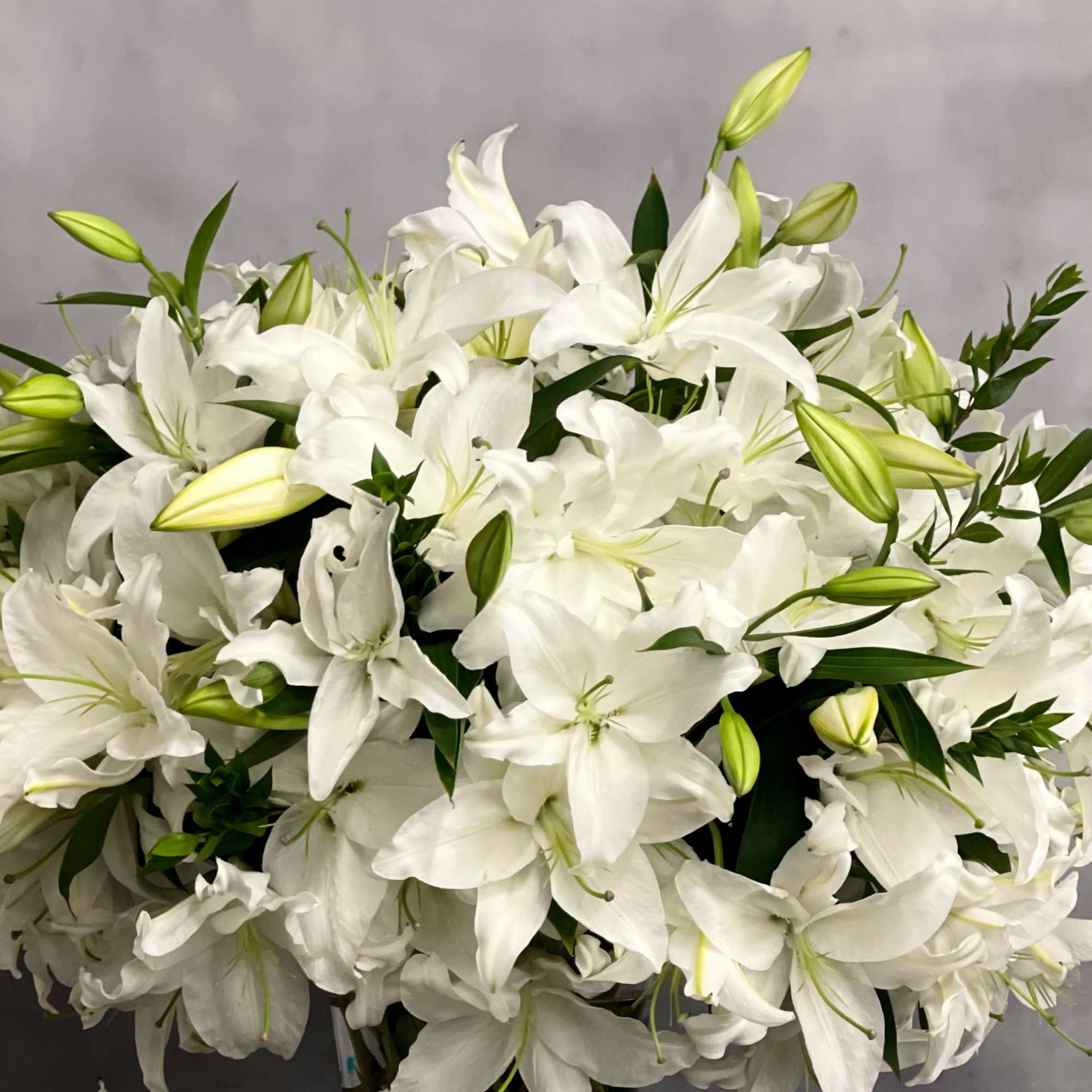 An arrangement that is made with 50 stems of Casablanca Lillies. A