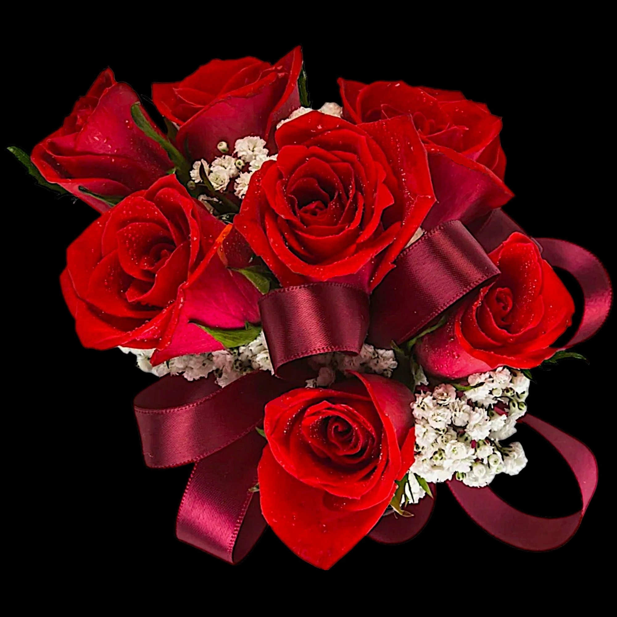 A classic red rose and baby&#039;s breath corsage compliments any outfit. Perfect