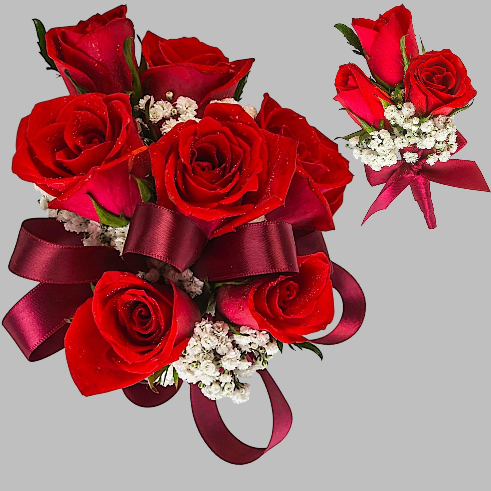 A classic red rose and baby&#039;s breath corsage compliments any outfit. Perfect