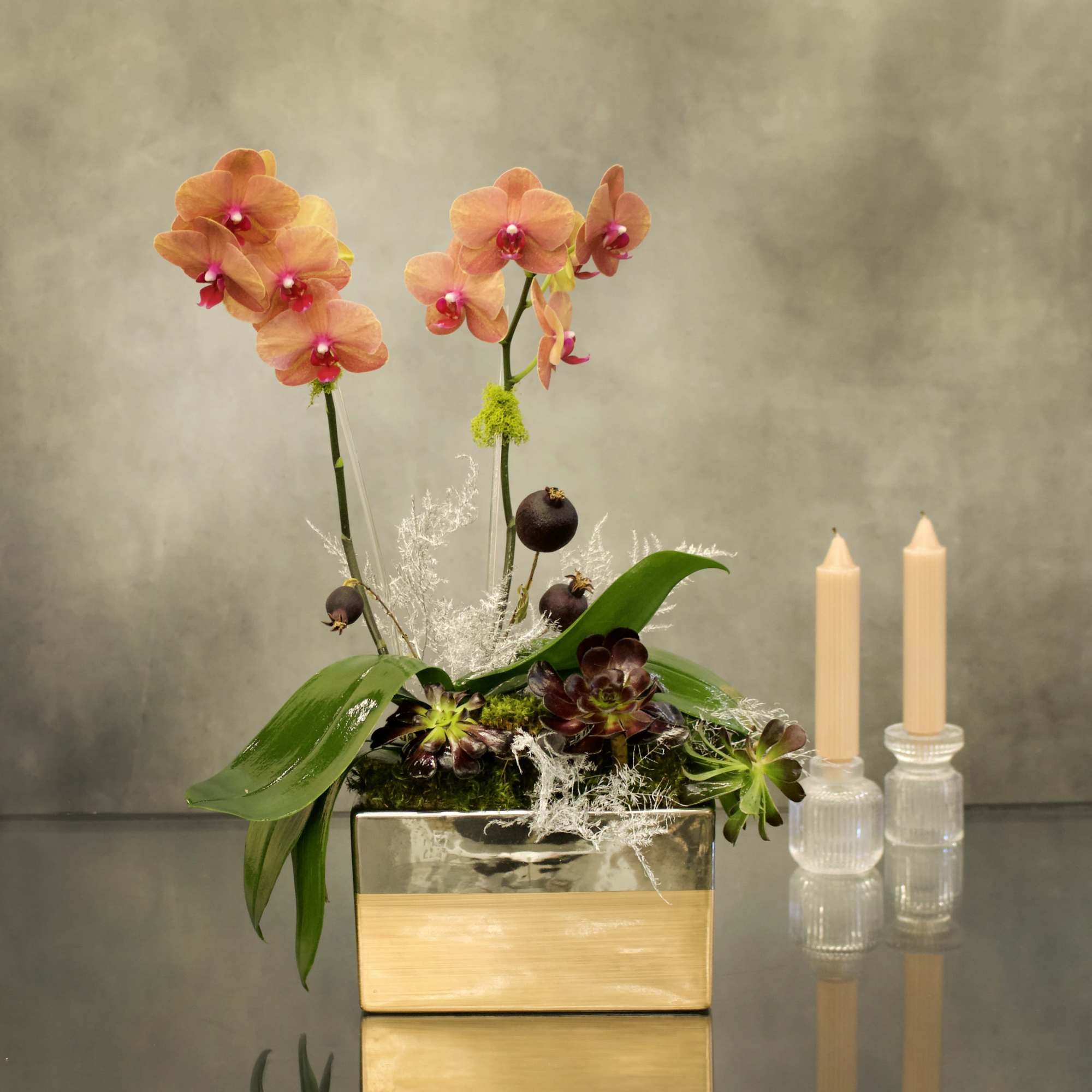 Welcome the fall season with this mini peach orchids nested in the