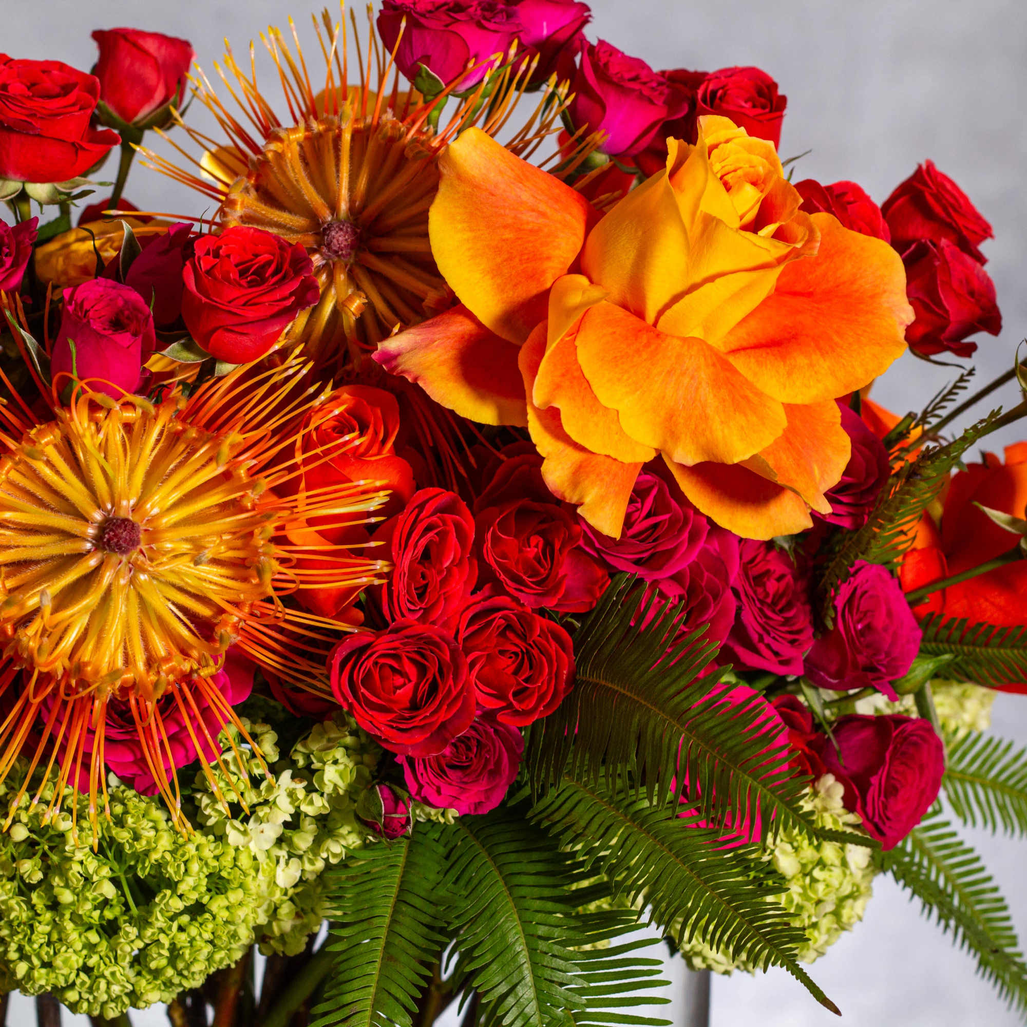 Indulge in a vibrant display reminiscent of a majestic tropical sunset with