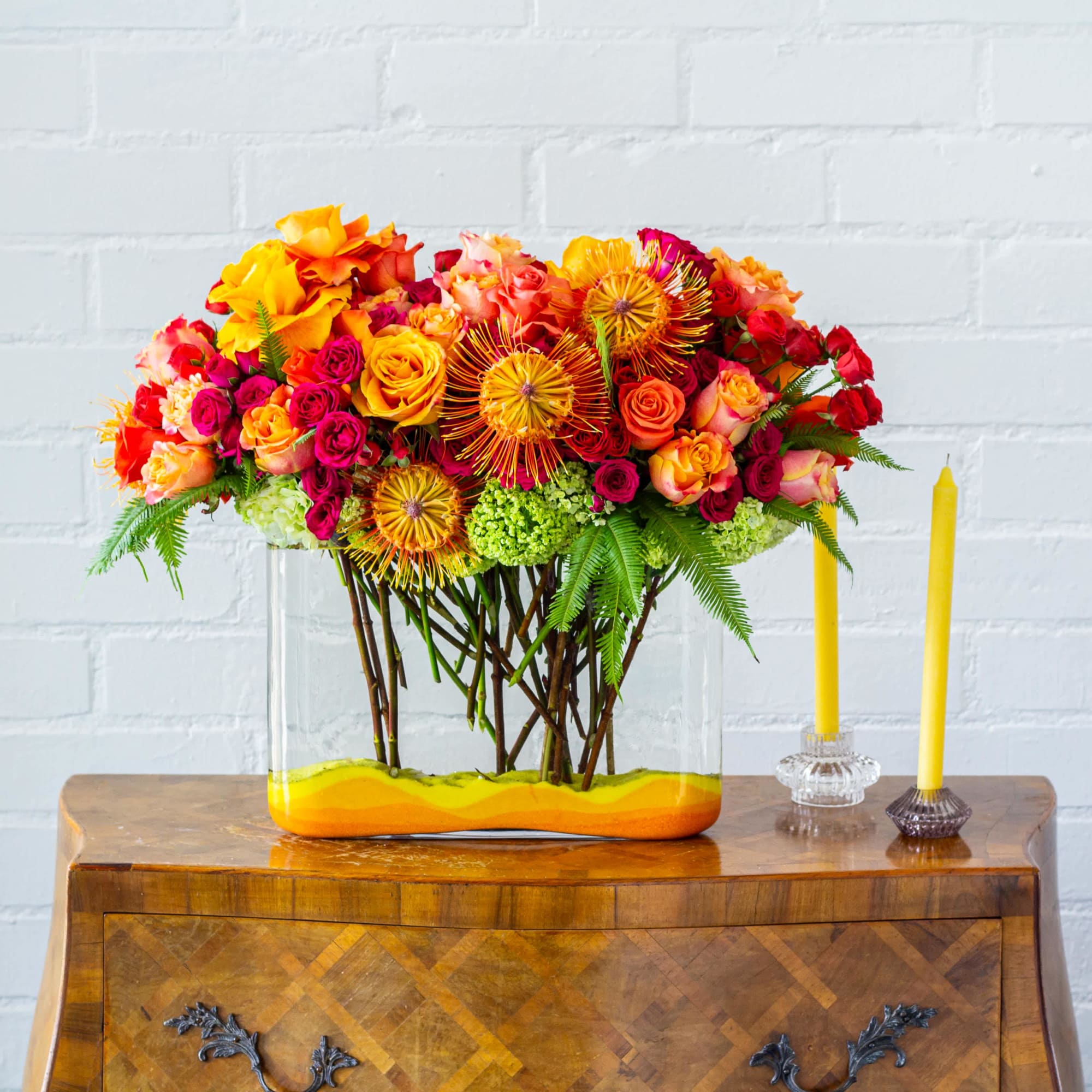 Indulge in a vibrant display reminiscent of a majestic tropical sunset with