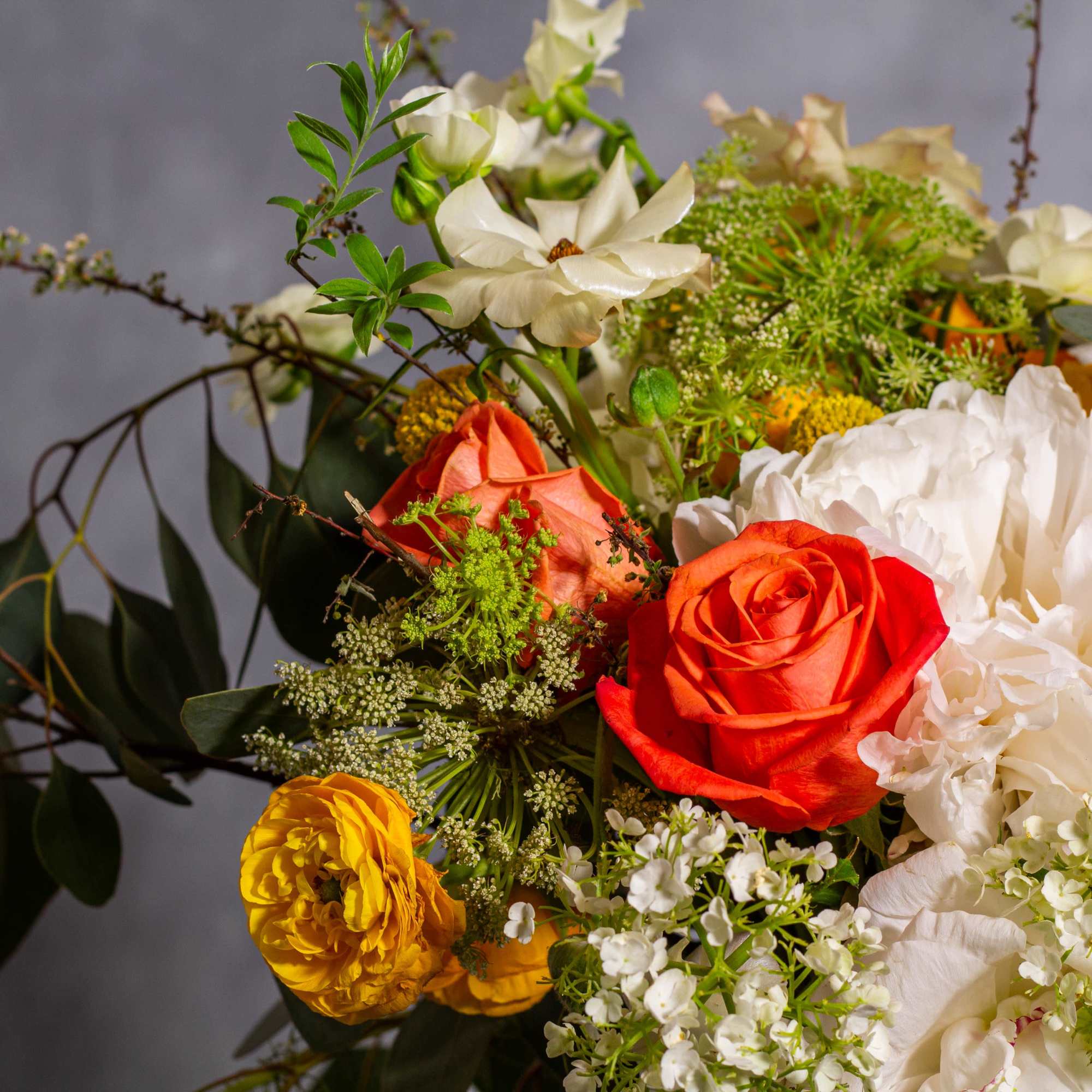 Step into a realm of modern sophistication with our exquisite floral arrangement