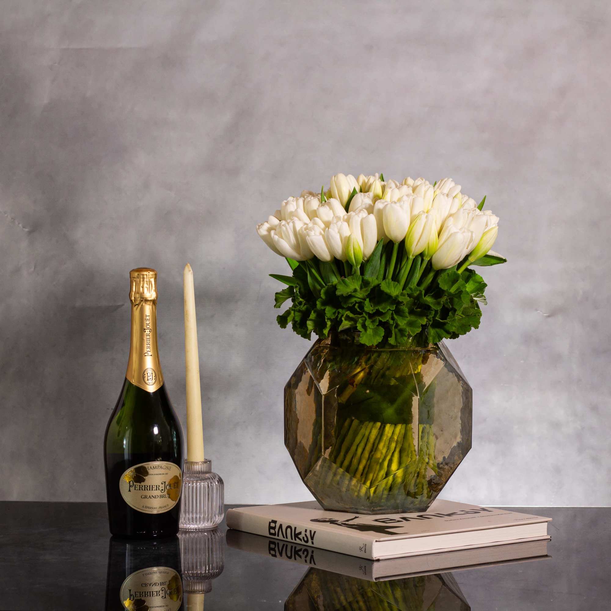 Indulge in a grand display of elegance with this stunning arrangement featuring