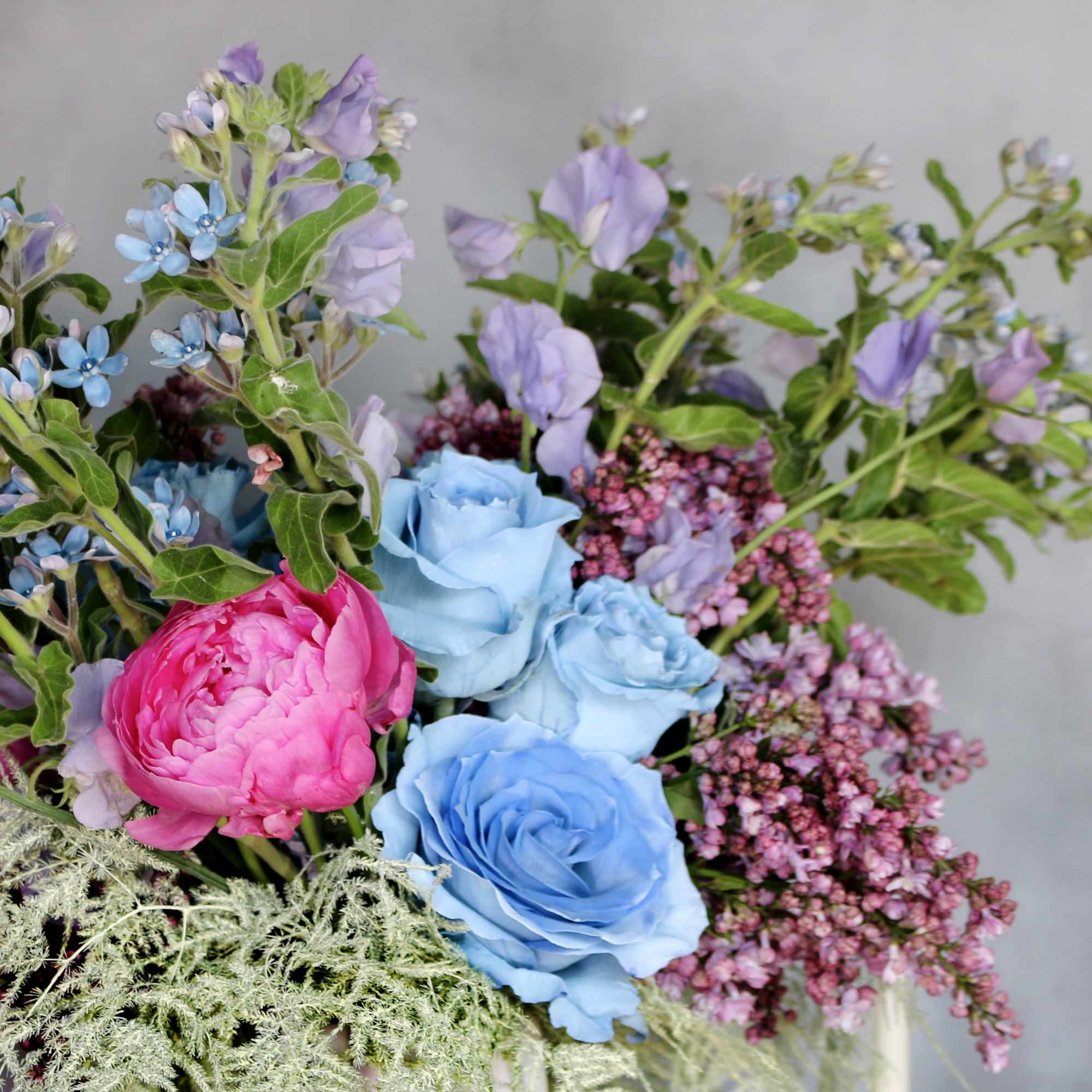 &quot;By The Shore&quot; consists of blue Roses, Peonies, Sweet Peas, Lilacs and