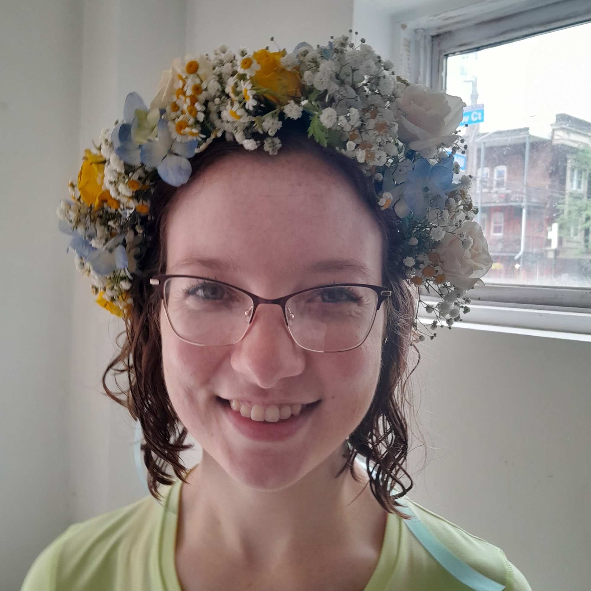 fresh garden yellow roses. blue delphinium and fewer few for the bridal