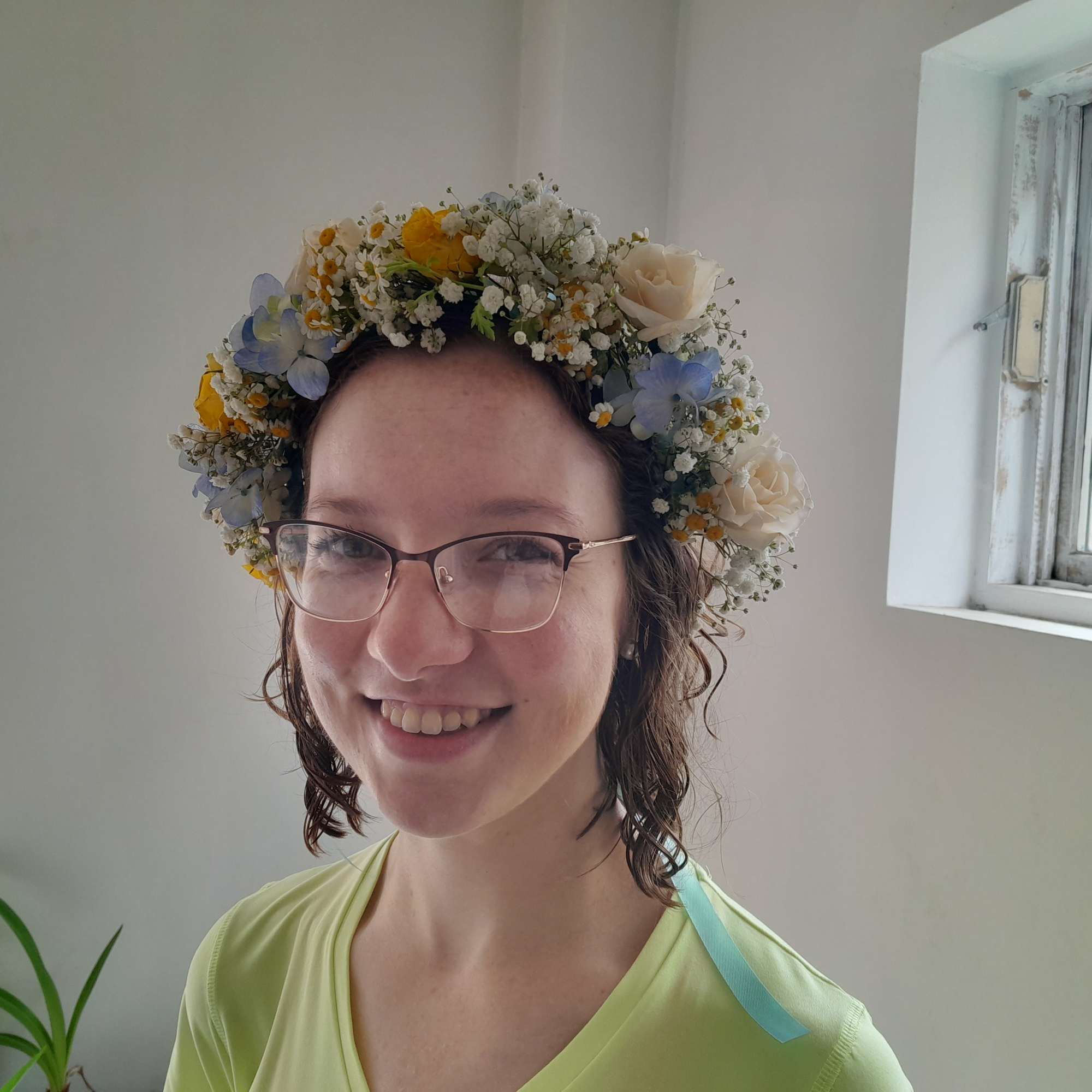 fresh garden yellow roses. blue delphinium and fewer few for the bridal