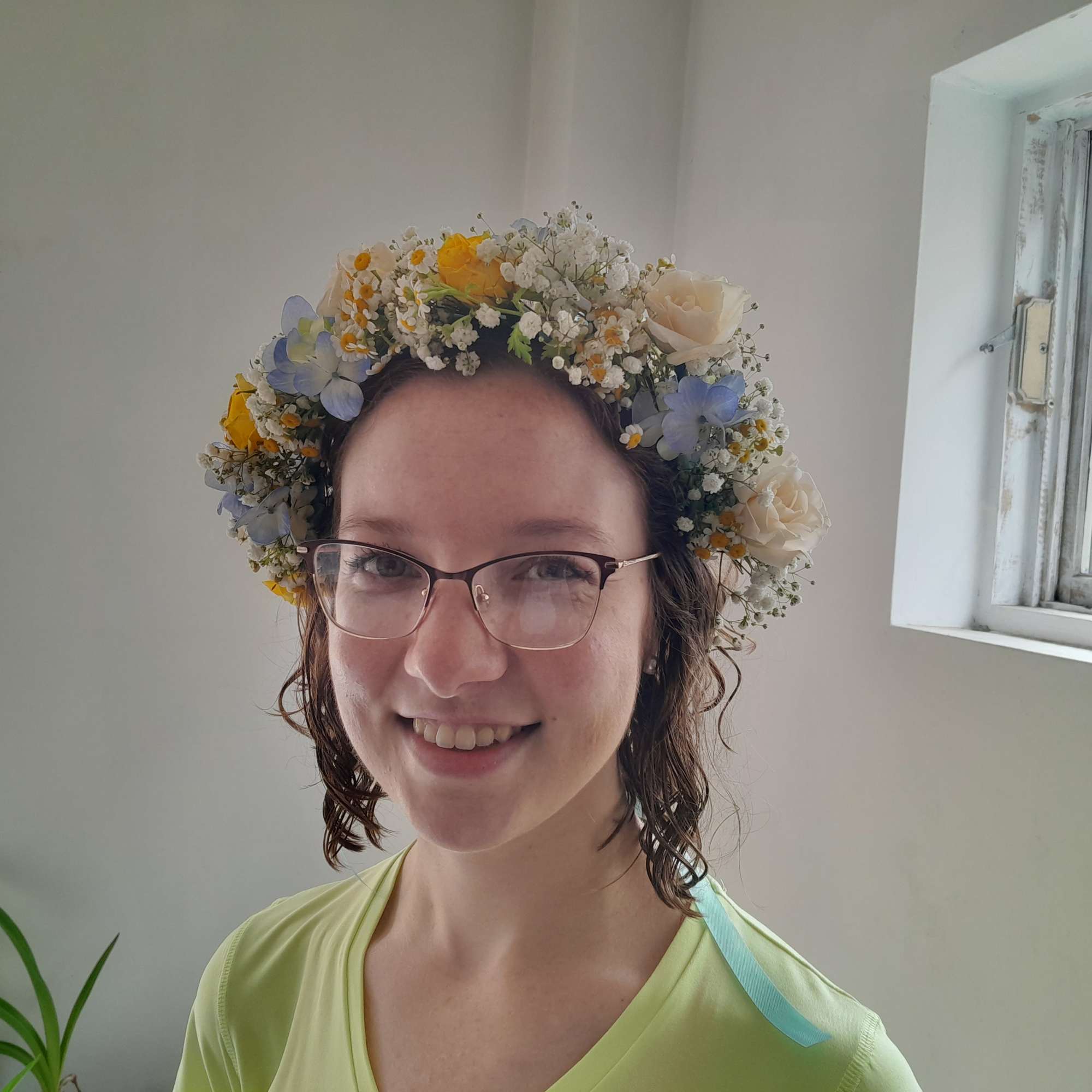 fresh garden yellow roses. blue delphinium and fewer few for the bridal