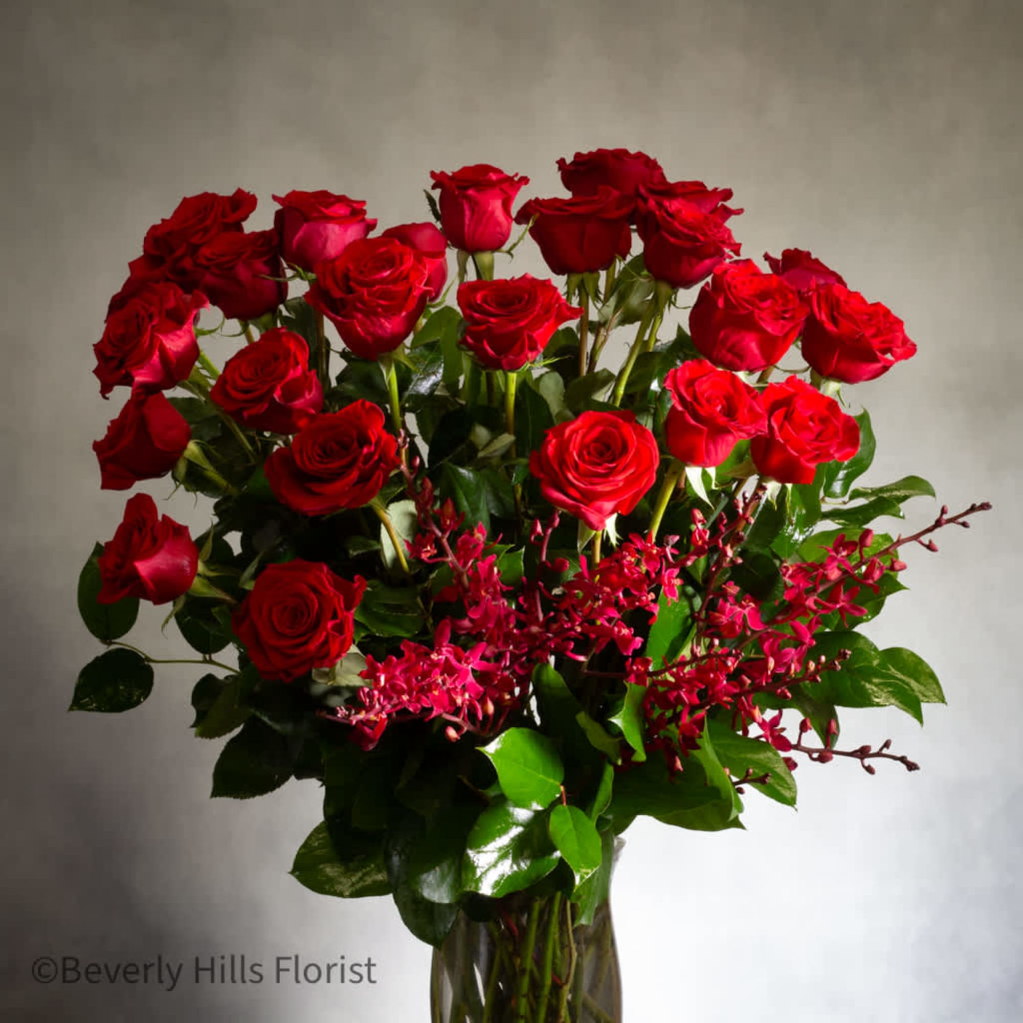 24 Stems of classic roses with orchids