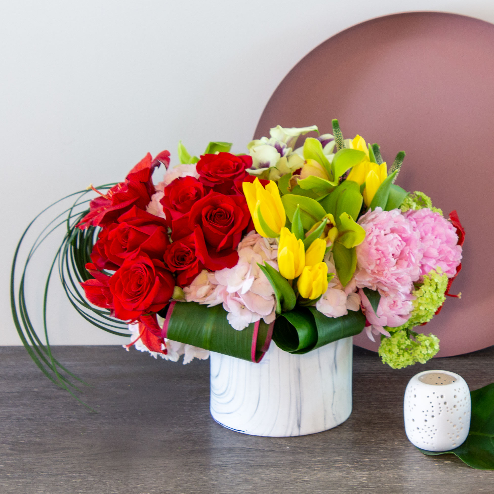 This chic, unique bouquet is served up with a fun, feminine mix