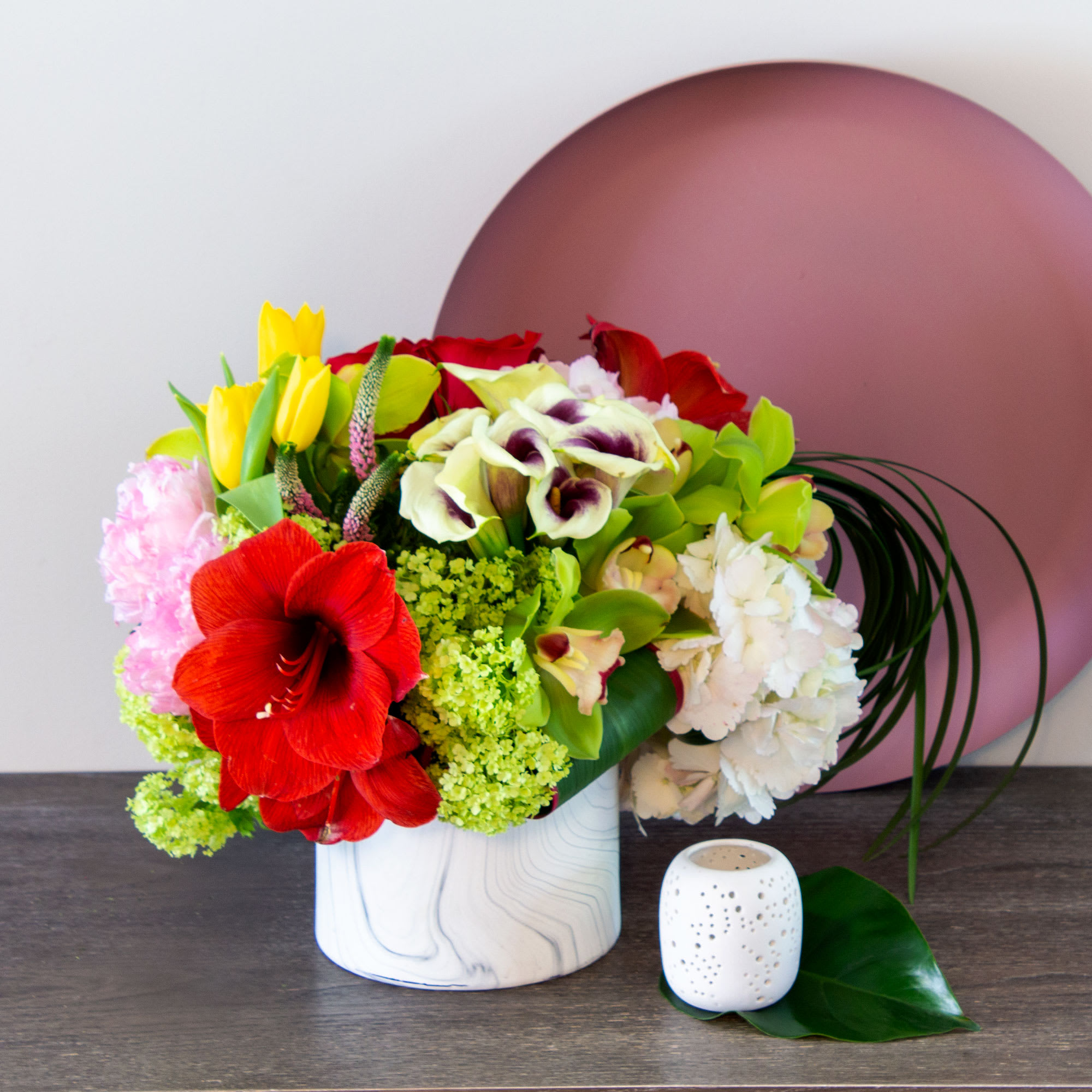 This chic, unique bouquet is served up with a fun, feminine mix