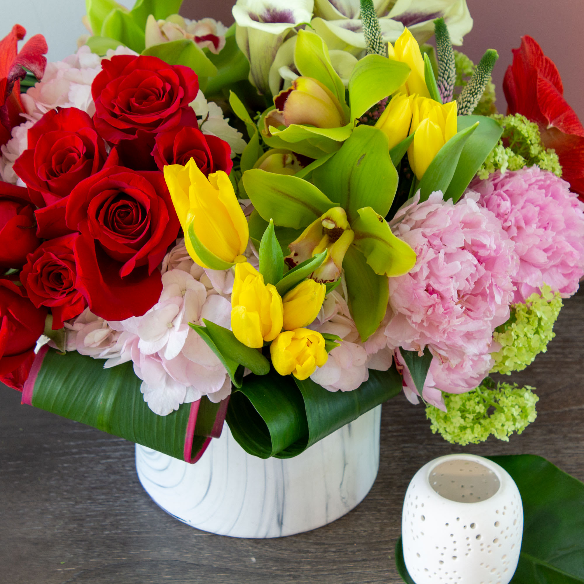 This chic, unique bouquet is served up with a fun, feminine mix