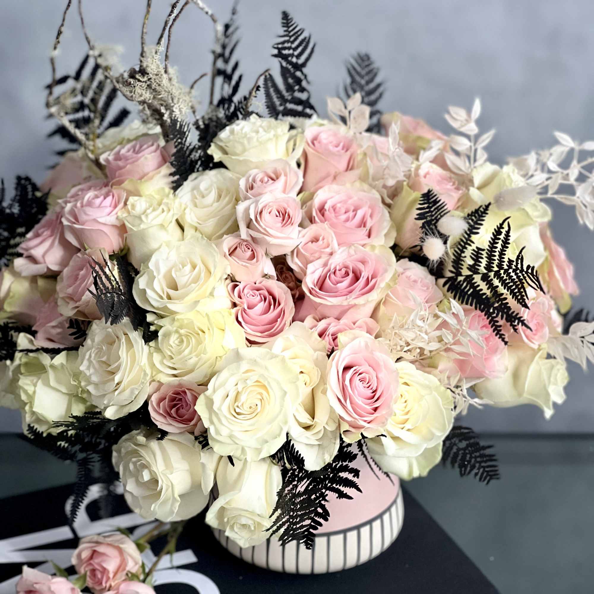 A unique fall floral mix expressed elegantly with neutral tones and splashes