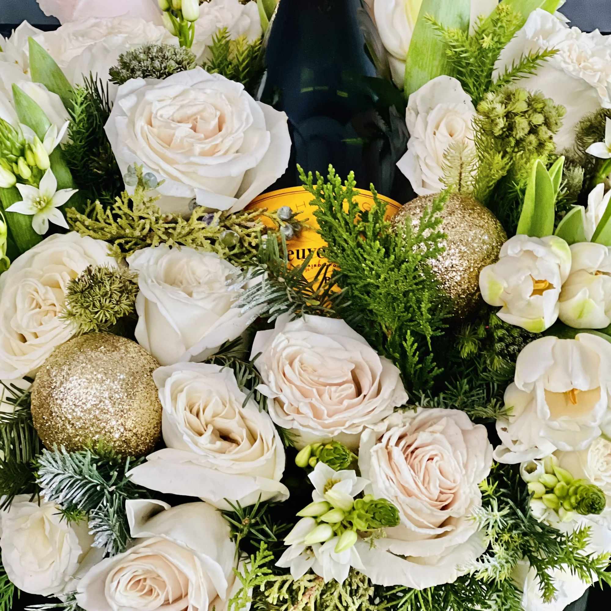 For a White holiday look, this elegant diversion combines soft Holiday Greens