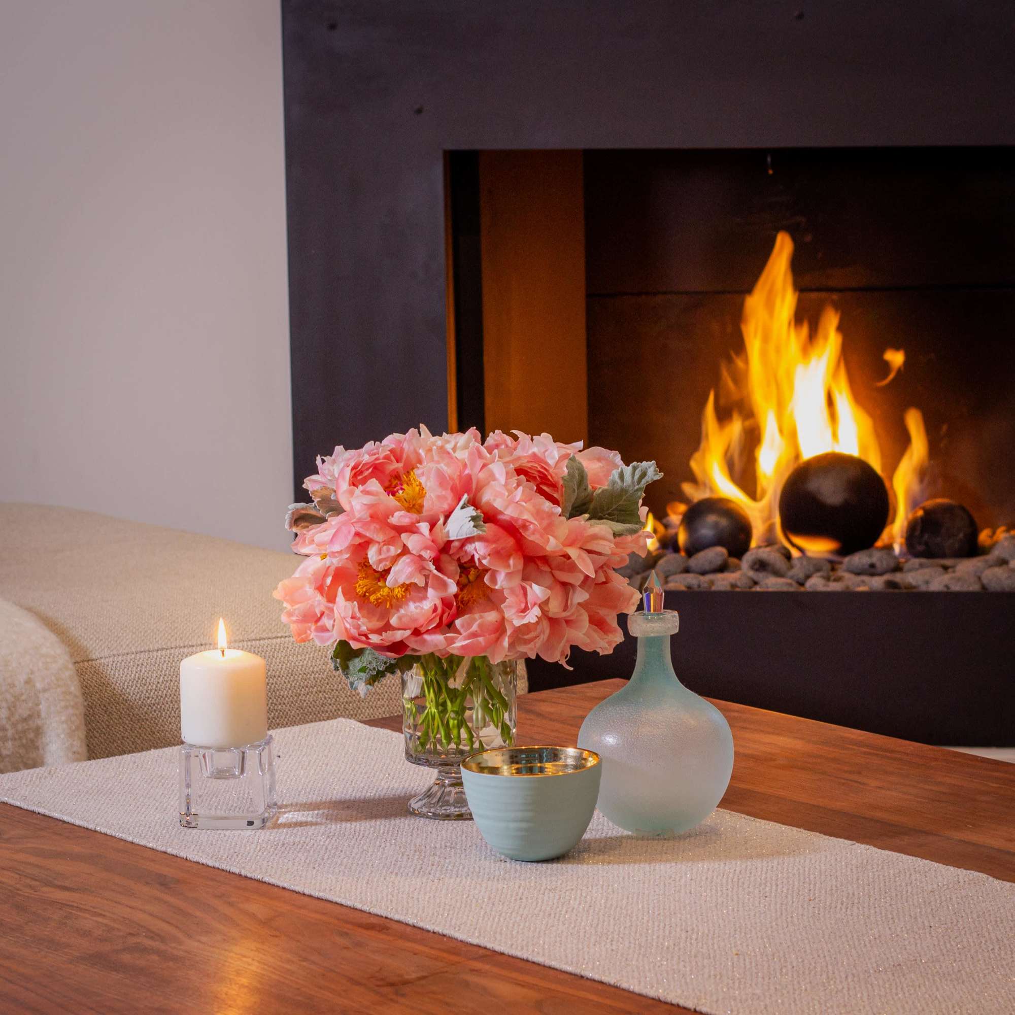 Indulge in the enchanting beauty of our coral color peonies arrangement, delicately