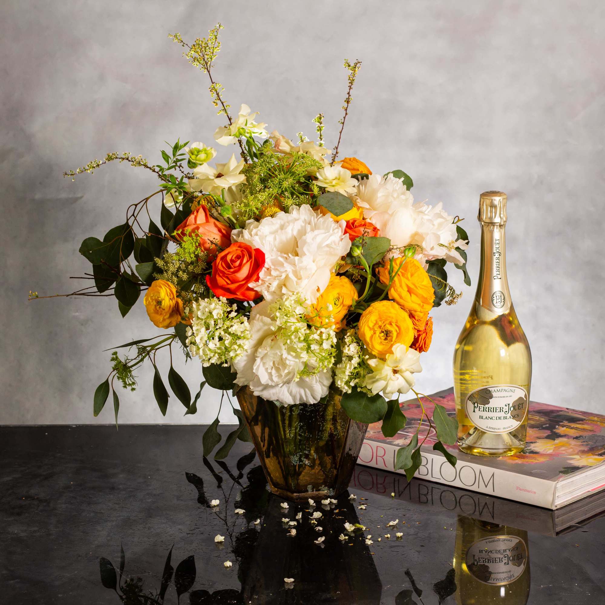 Step into a realm of modern sophistication with our exquisite floral arrangement