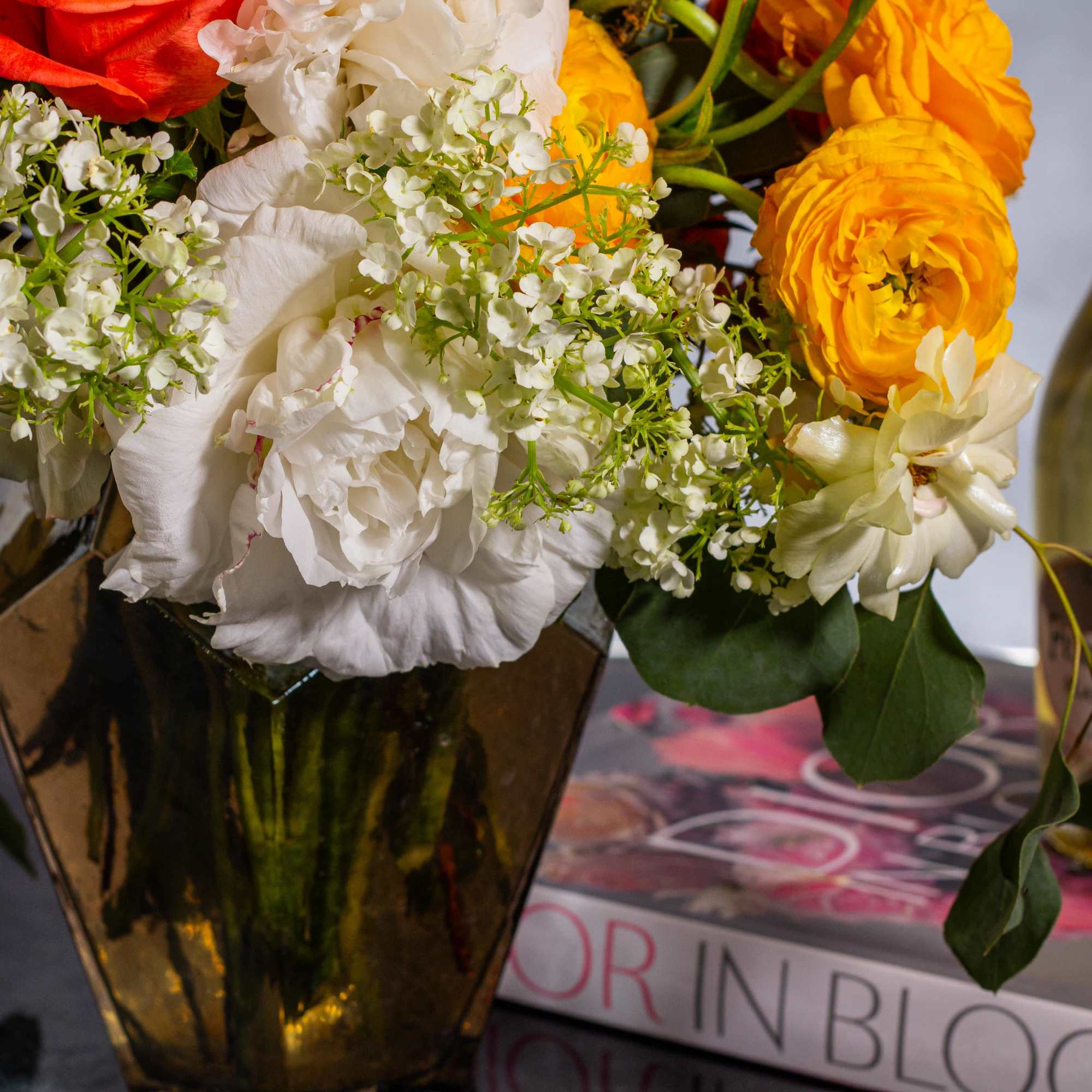 Step into a realm of modern sophistication with our exquisite floral arrangement