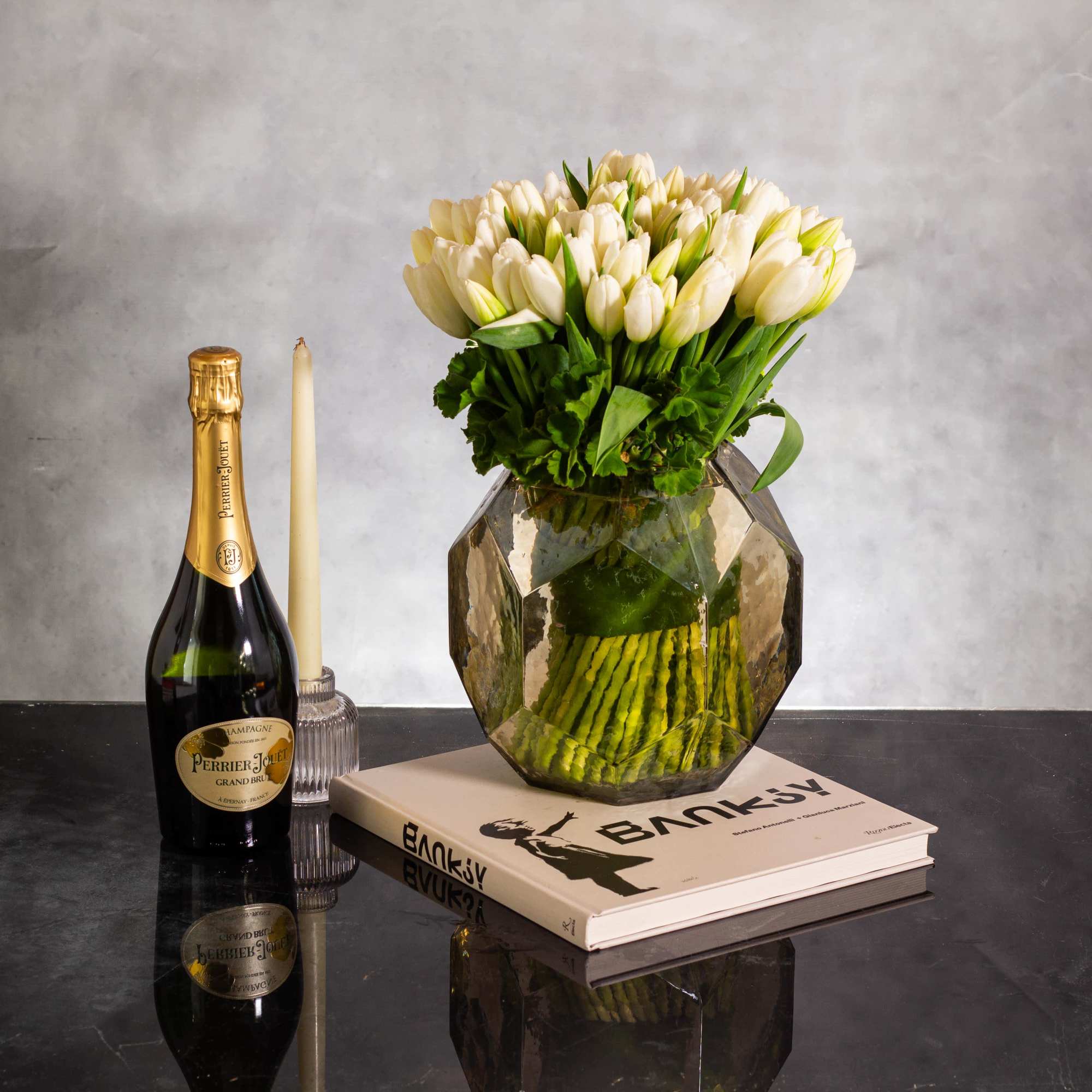 Indulge in a grand display of elegance with this stunning arrangement featuring