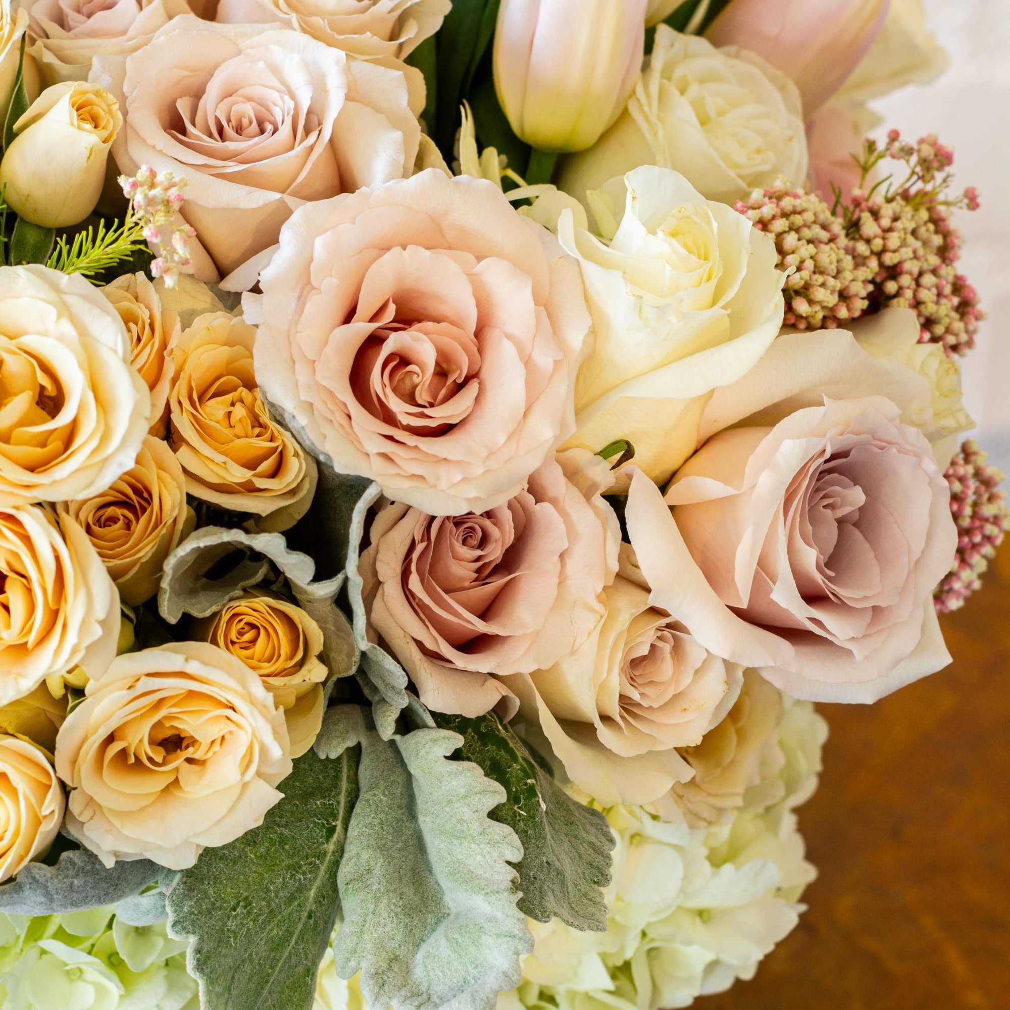  Delight in the gentle beauty of our floral arrangement, featuring soft