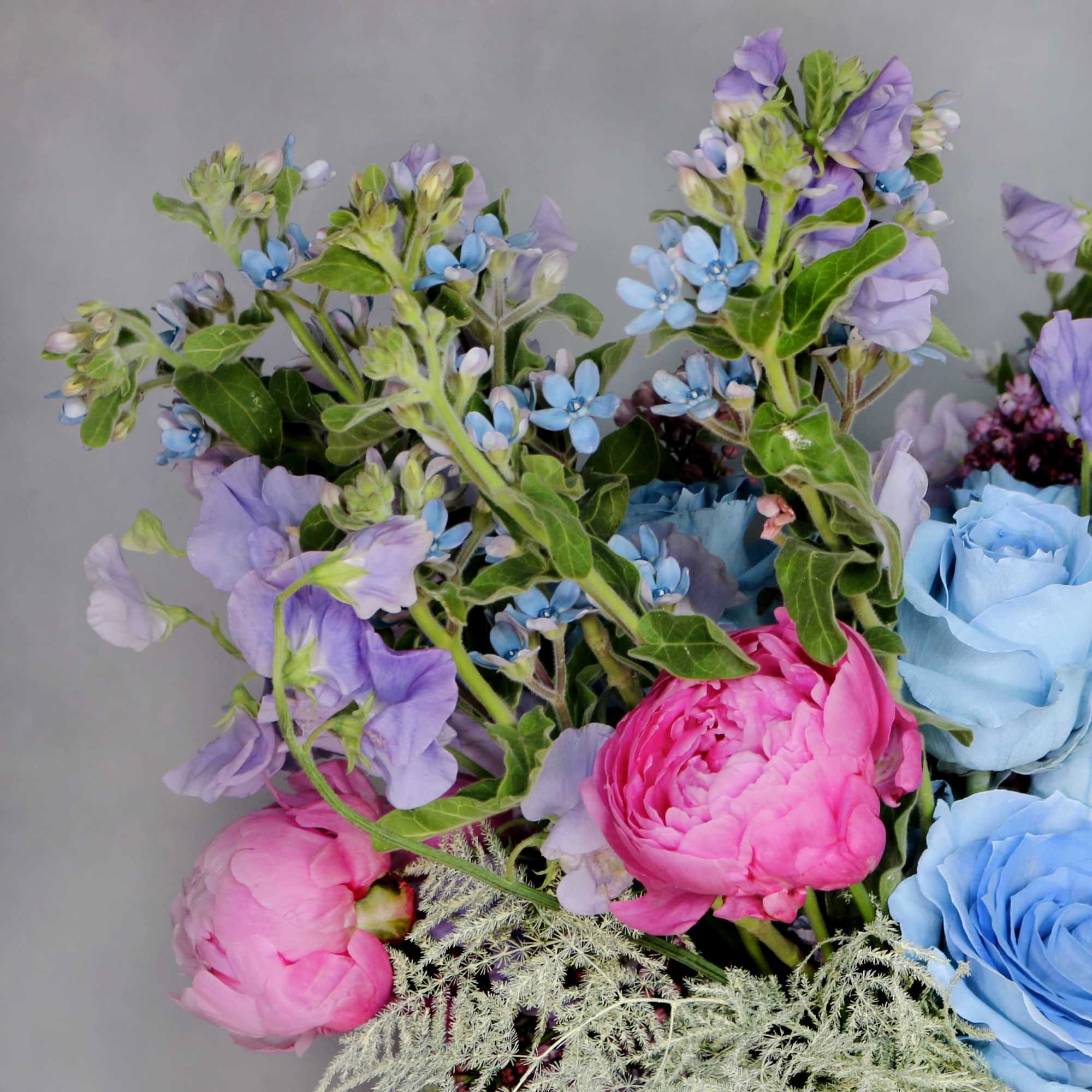 &quot;By The Shore&quot; consists of blue Roses, Peonies, Sweet Peas, Lilacs and