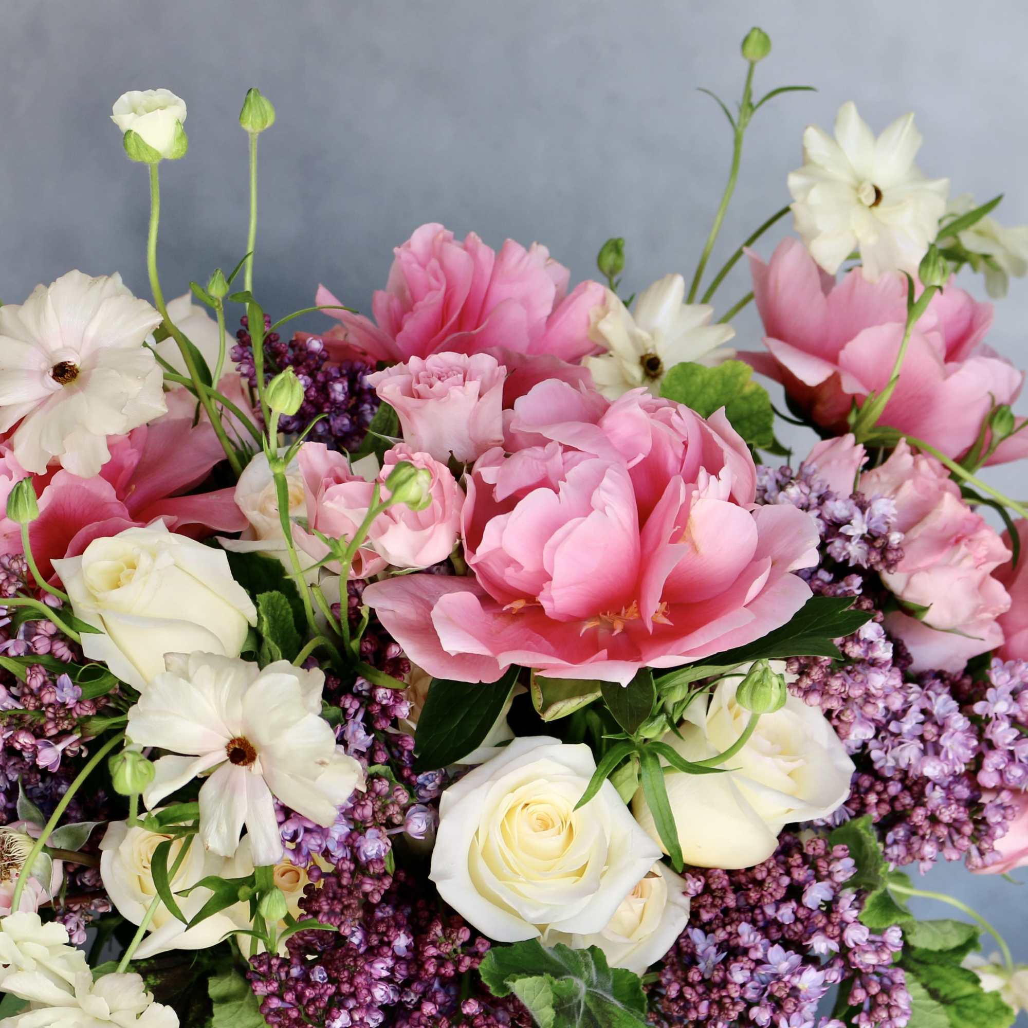 &quot;Ophelia&quot; is a true notion of delicacy. This arrangement consists of Lilacs