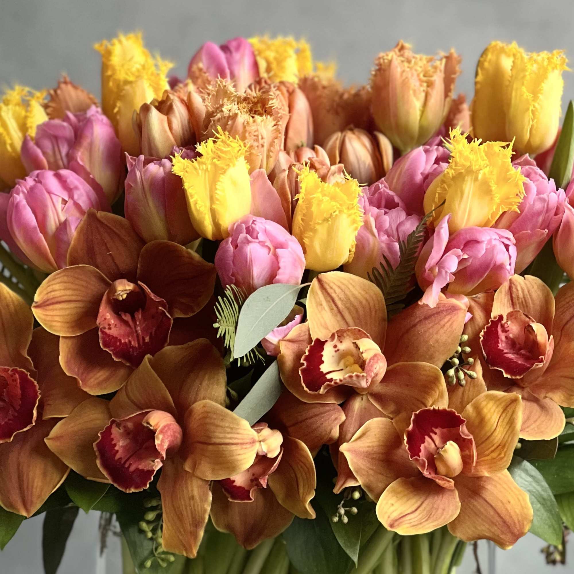 A modern twist to a classic flower! Various shades of colorful Tulips