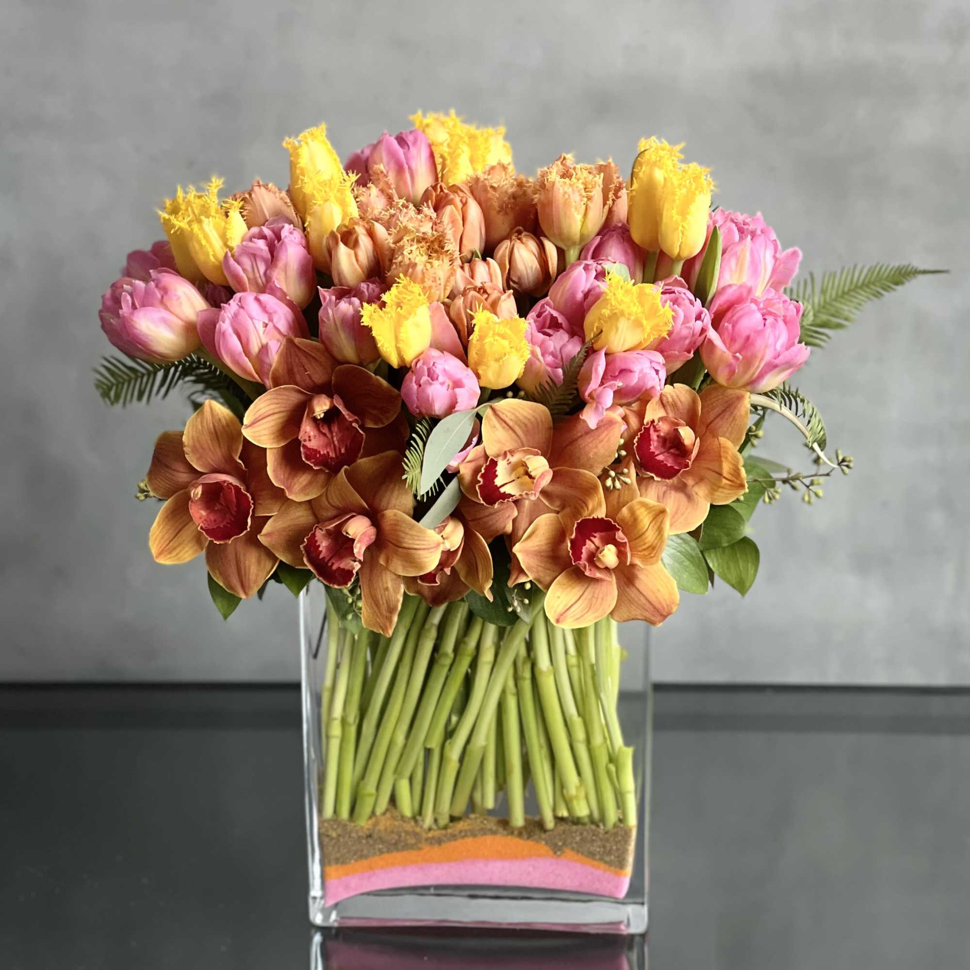 A modern twist to a classic flower! Various shades of colorful Tulips