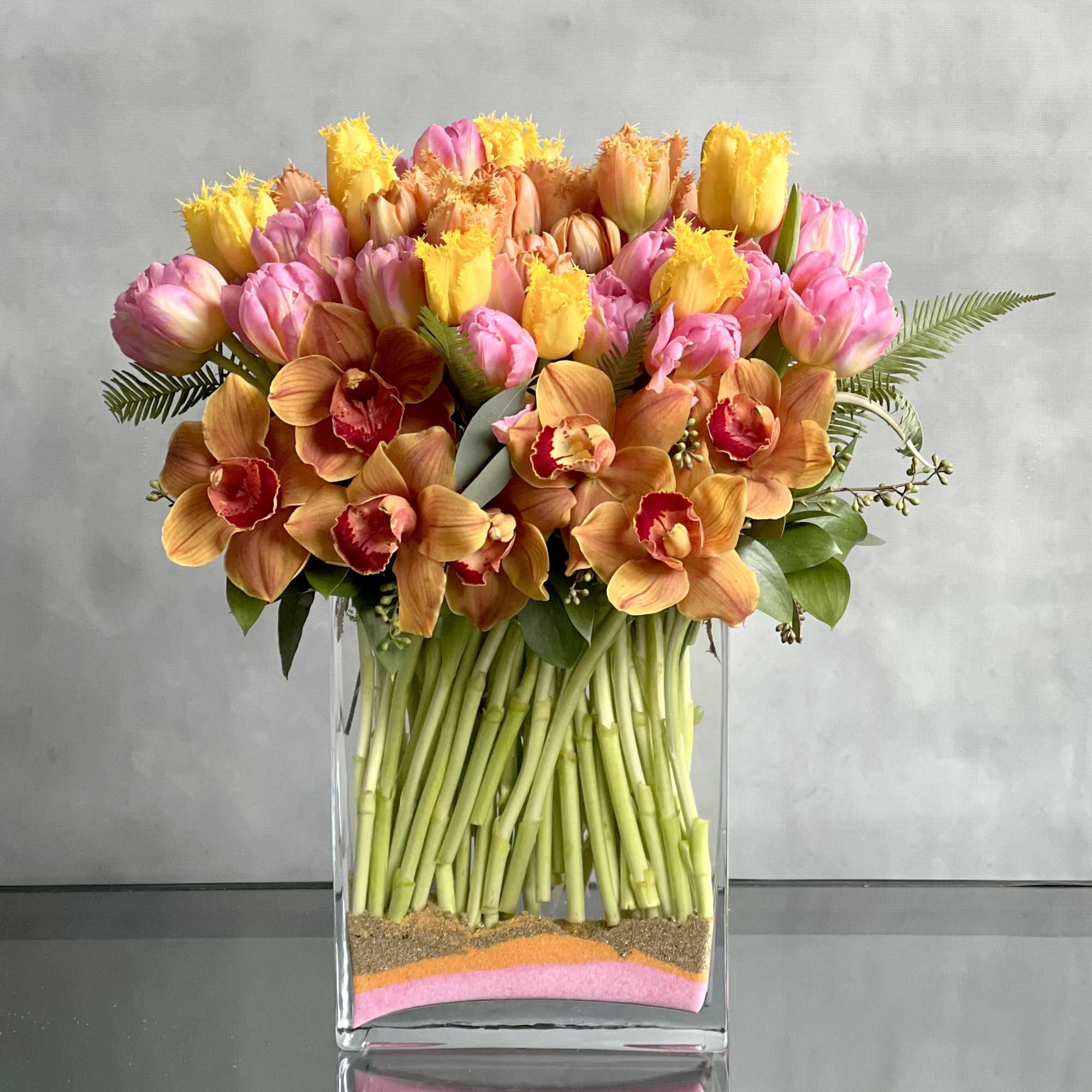 A modern twist to a classic flower! Various shades of colorful Tulips