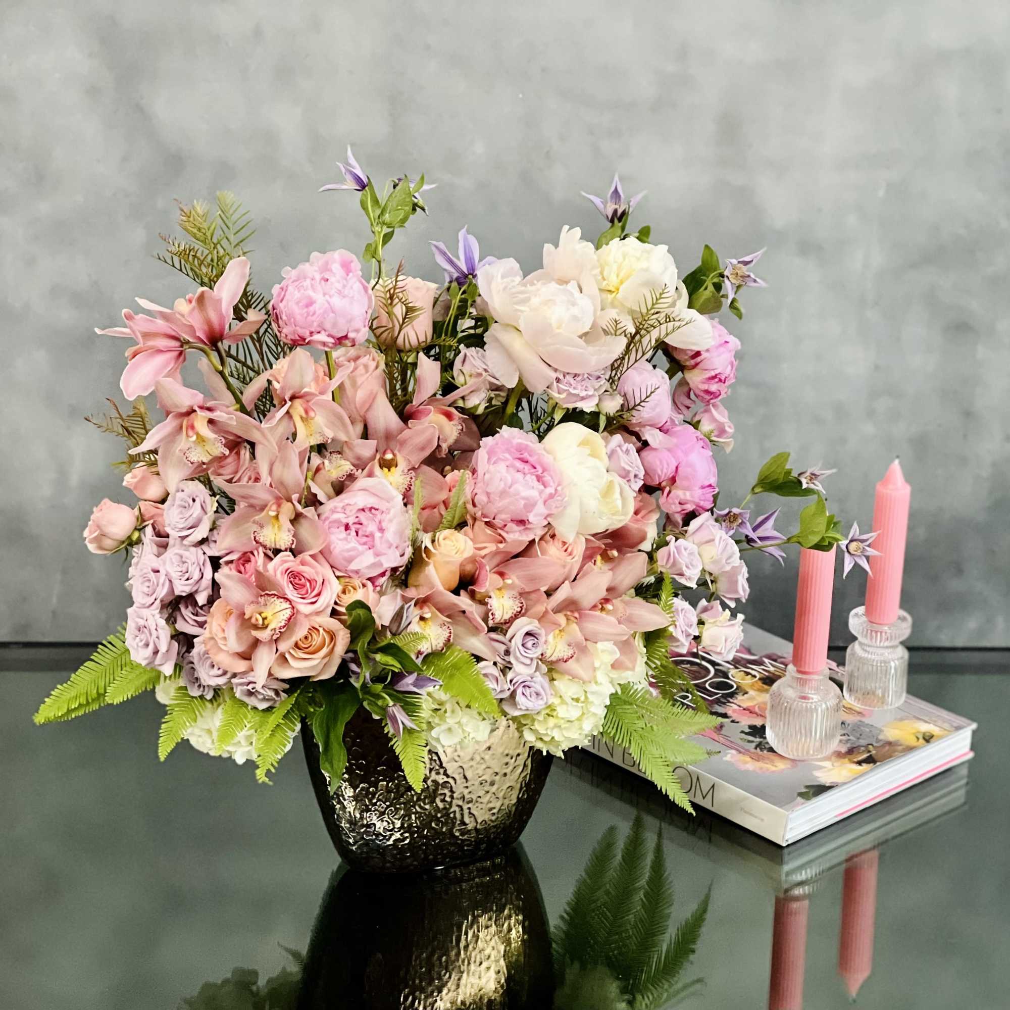 A sweet touch to a beautiful arrangement. In this piece, we have