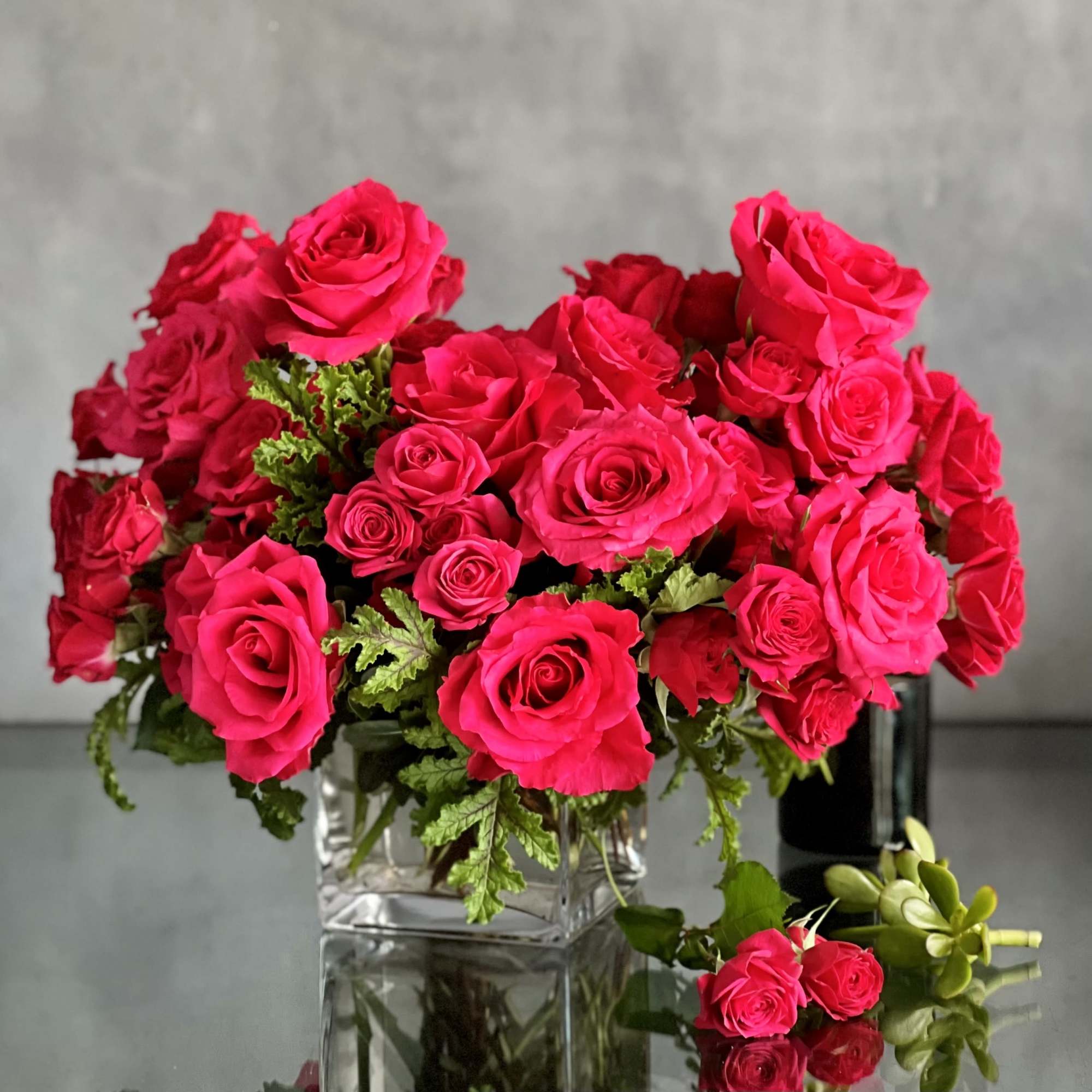 Delight in the luxurious and feminine beauty of our exquisite floral arrangement