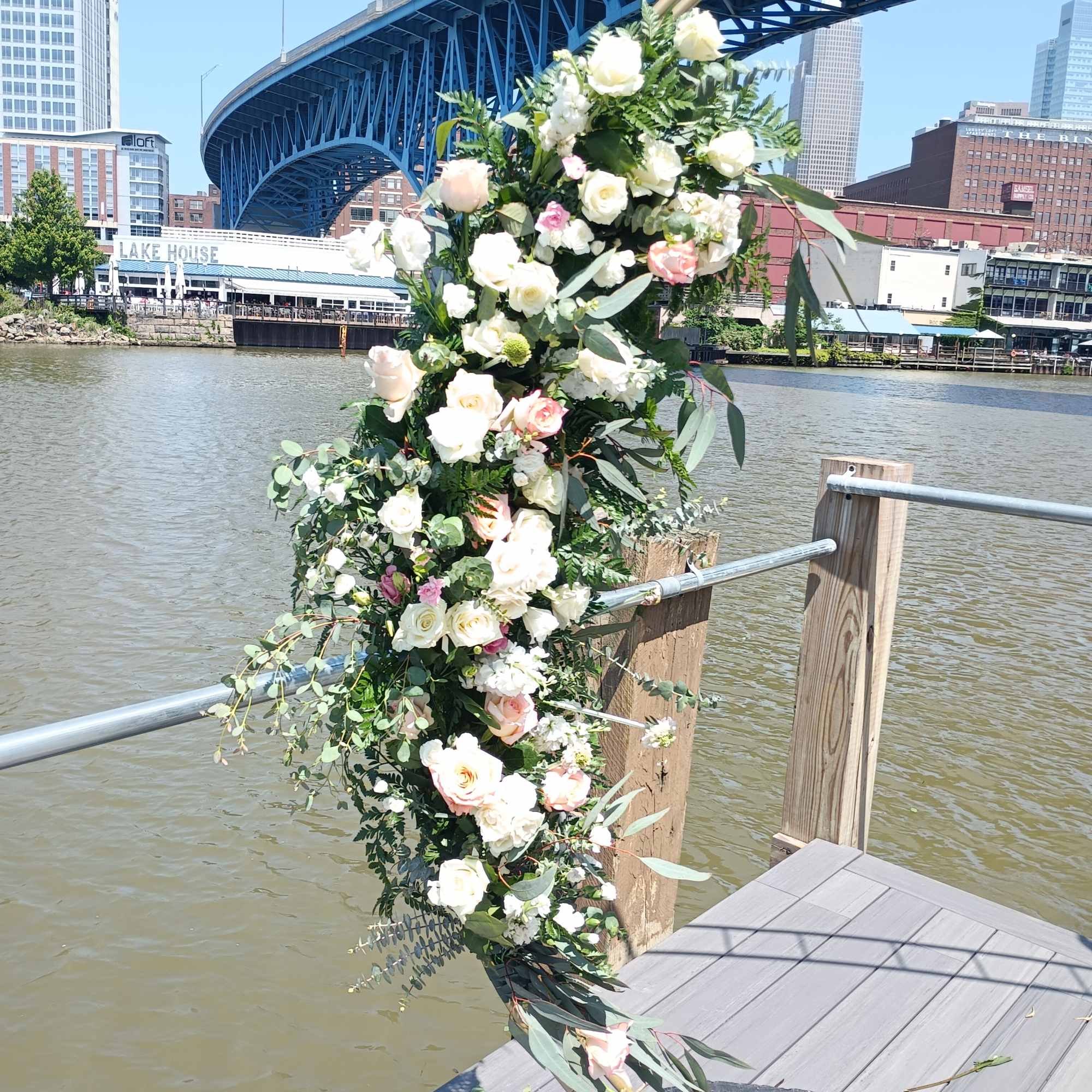 Beautiful vintage white &amp; pink flowers and greens asymmetrical archway  