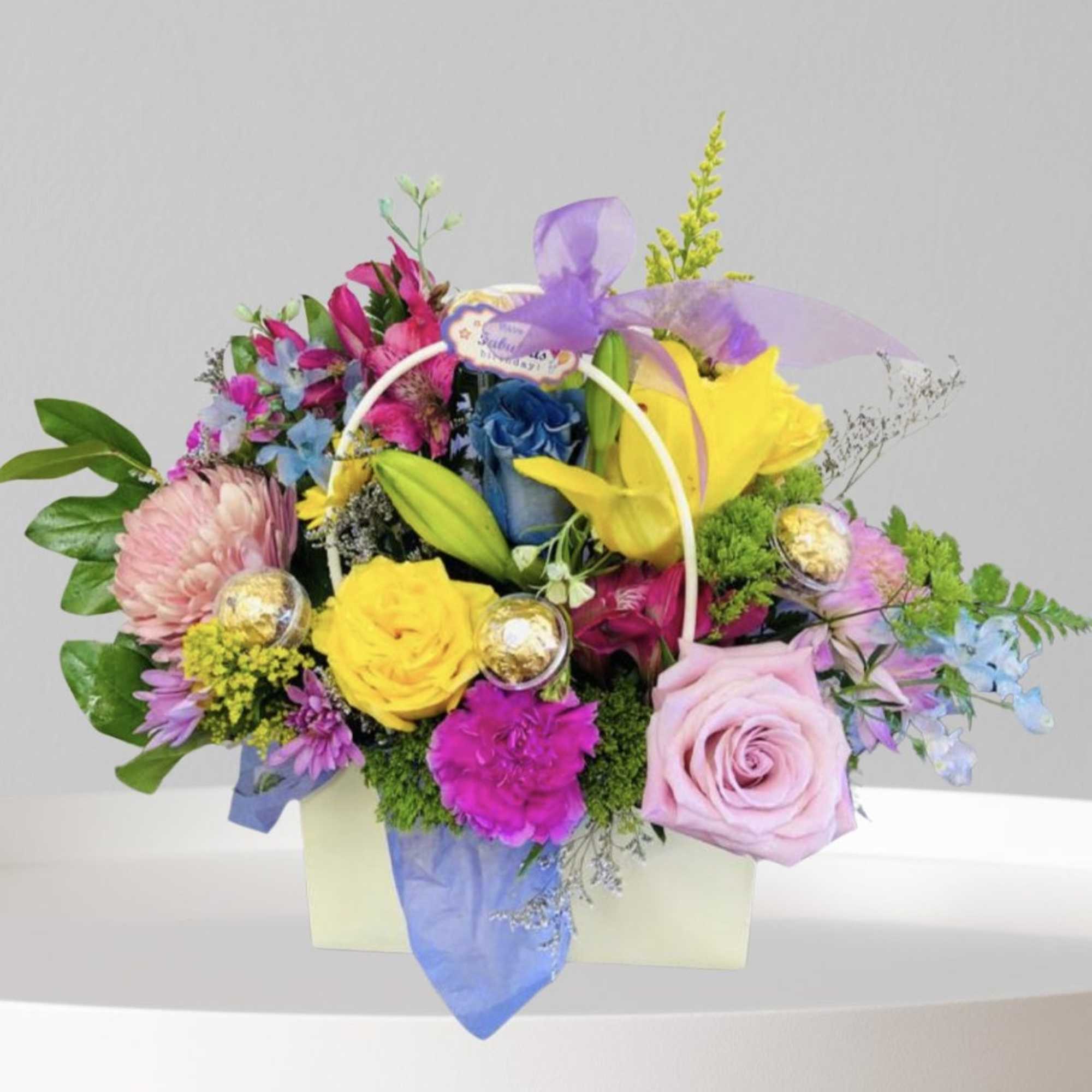 Beautiful Assorted Floral Purse With Fererro Rocher Chocolates.

Measurements:
Approximately 14&#039;&#039; High x 9&#039;&#039;