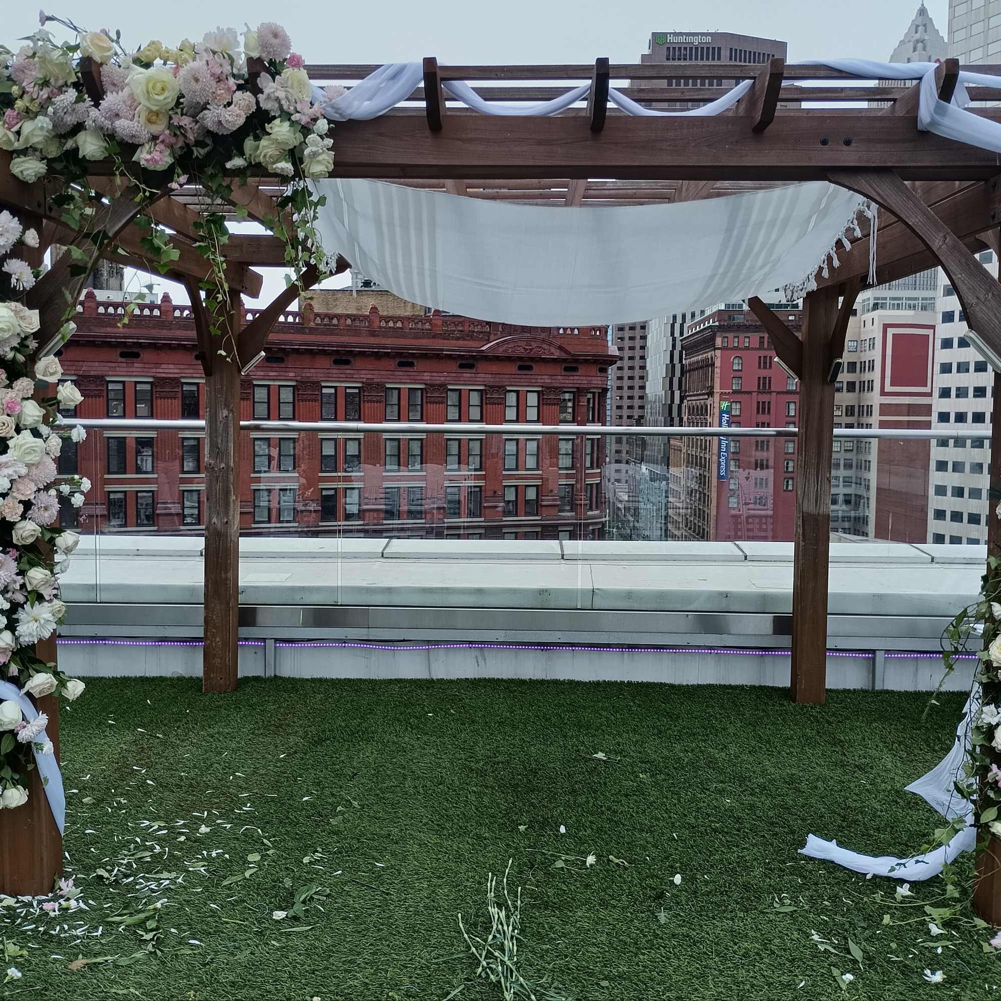 Beautiful white, pink and blush roses, carnations and other flowers huppah decor