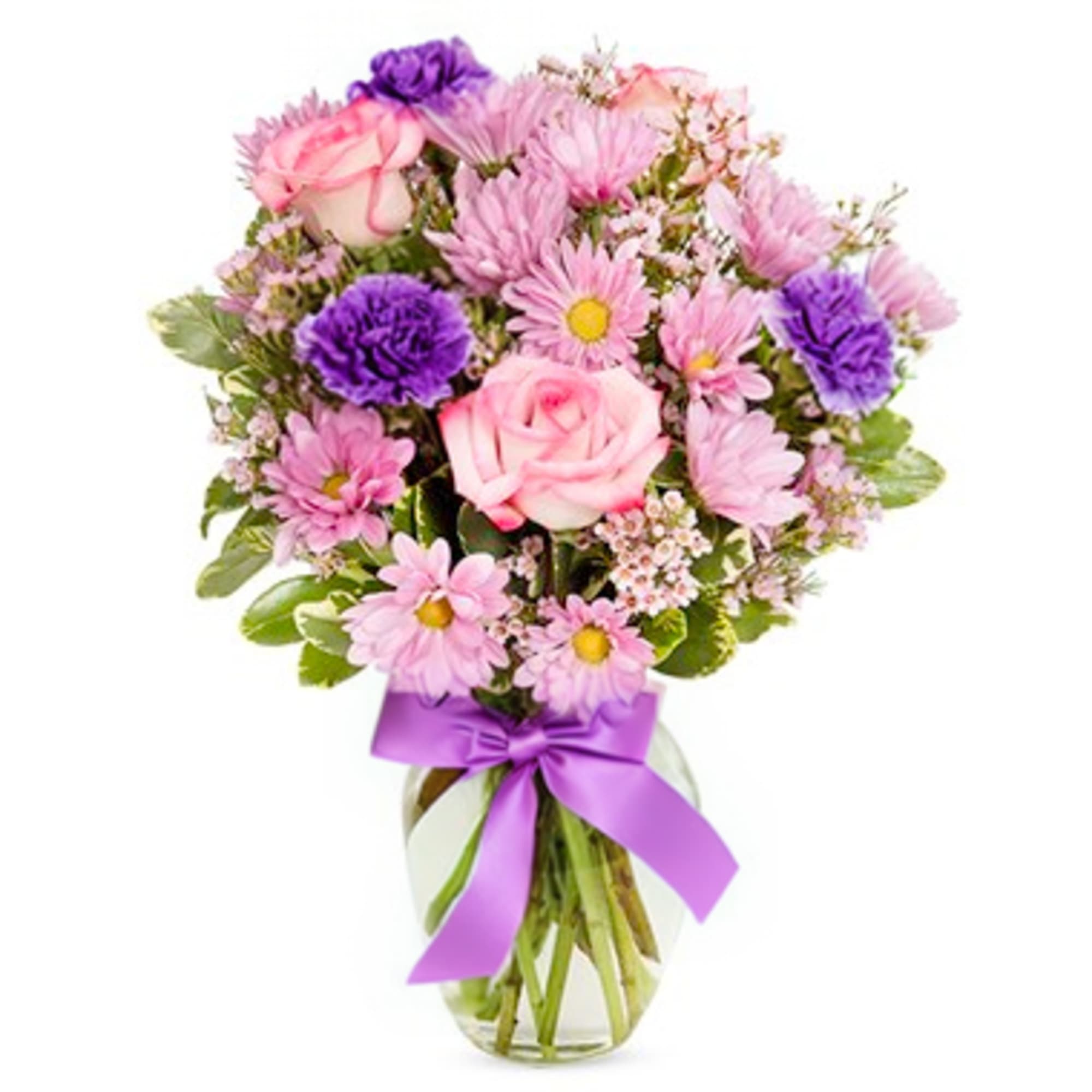 In our Love Blooms arrangement you get Roses, daisies, Carnations, wax flower