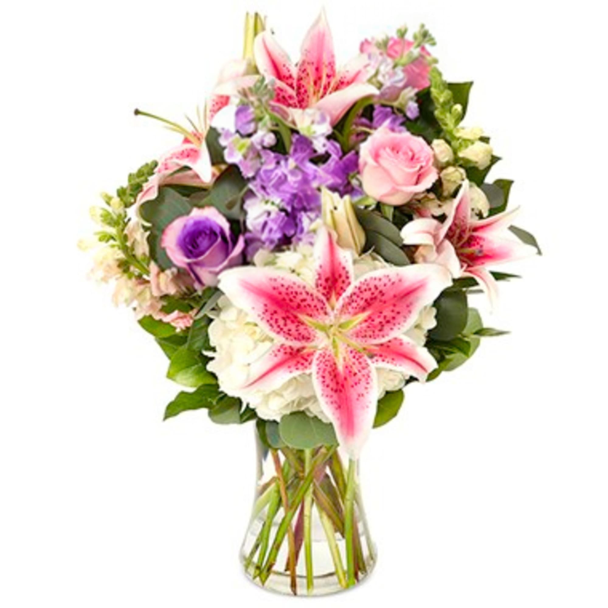 Send comfort and love with this meaningful arrangement showcasing blush pinks and