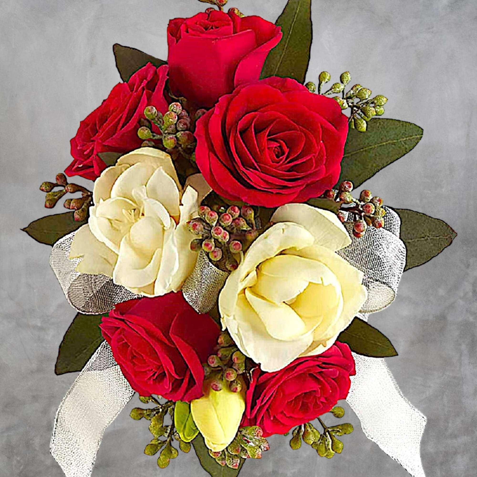 Fragrant and fabulous, this elegant corsage of crimson roses and white freesia