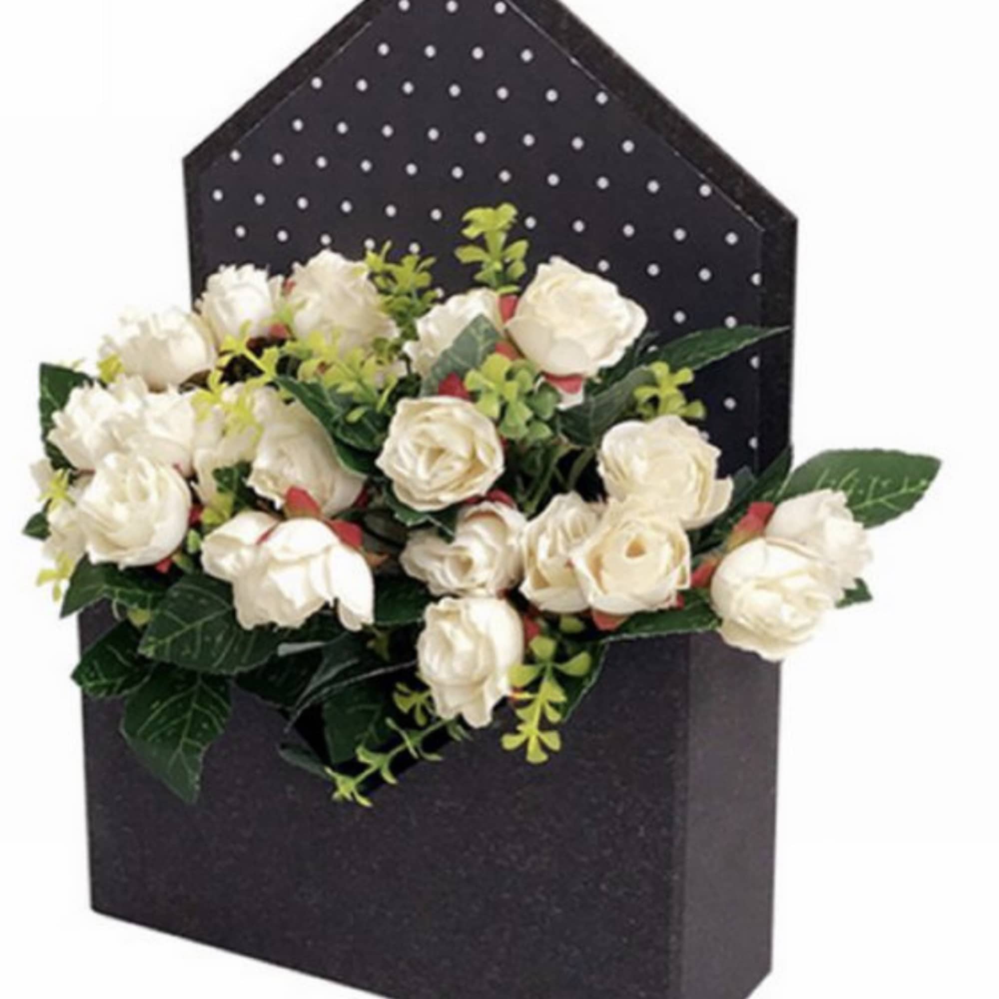 This modern and lovely flower arrangement is a mix of flowers in This modern and lovely flower arrangement is a mix of flowers in