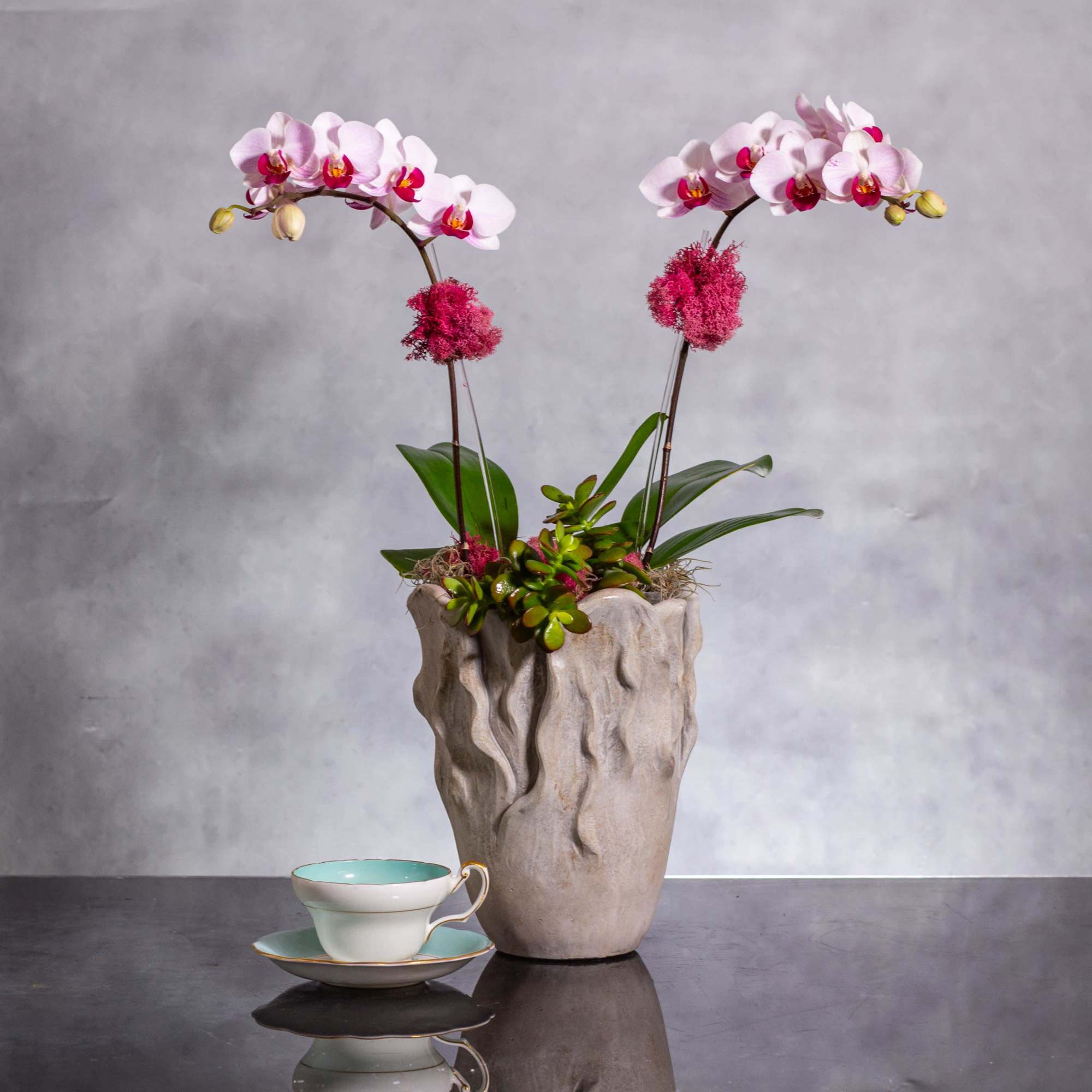 Immerse yourself in the natural beauty of our exquisite floral arrangement featuring
