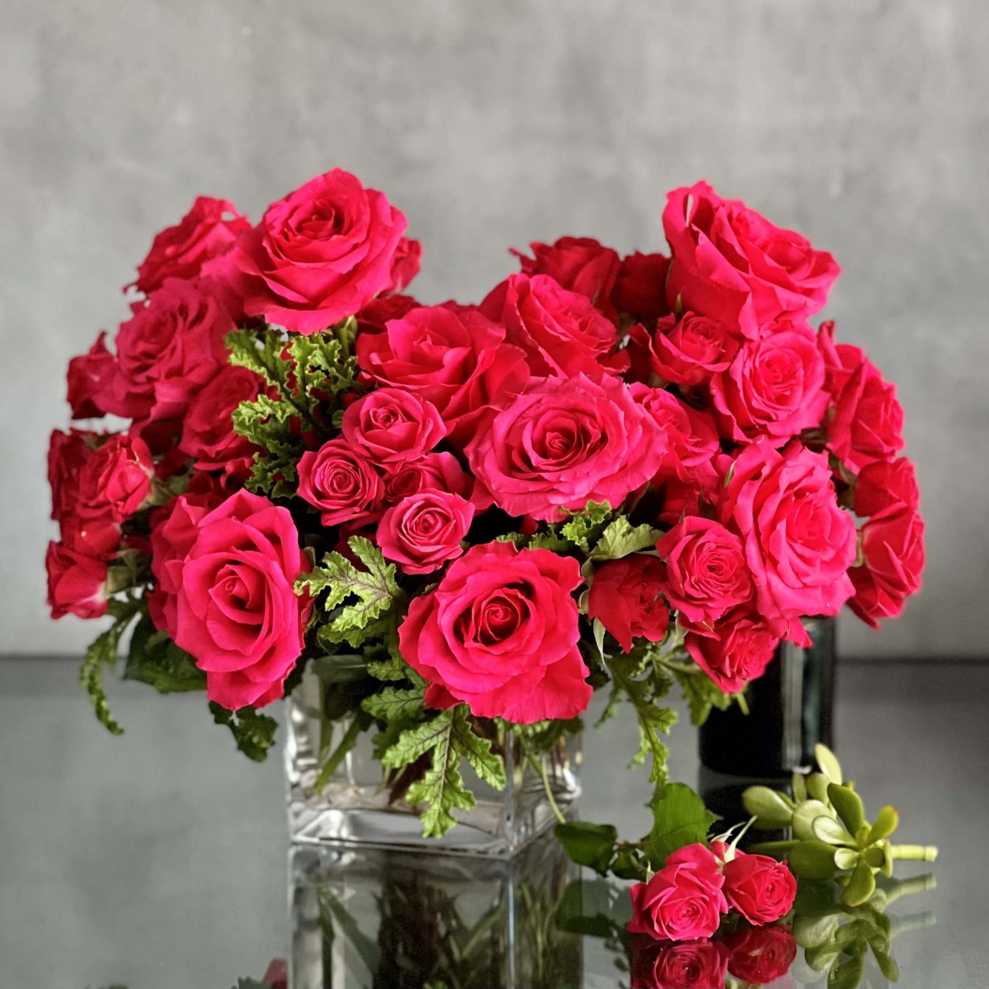 Delight in the luxurious and feminine beauty of our exquisite floral arrangement