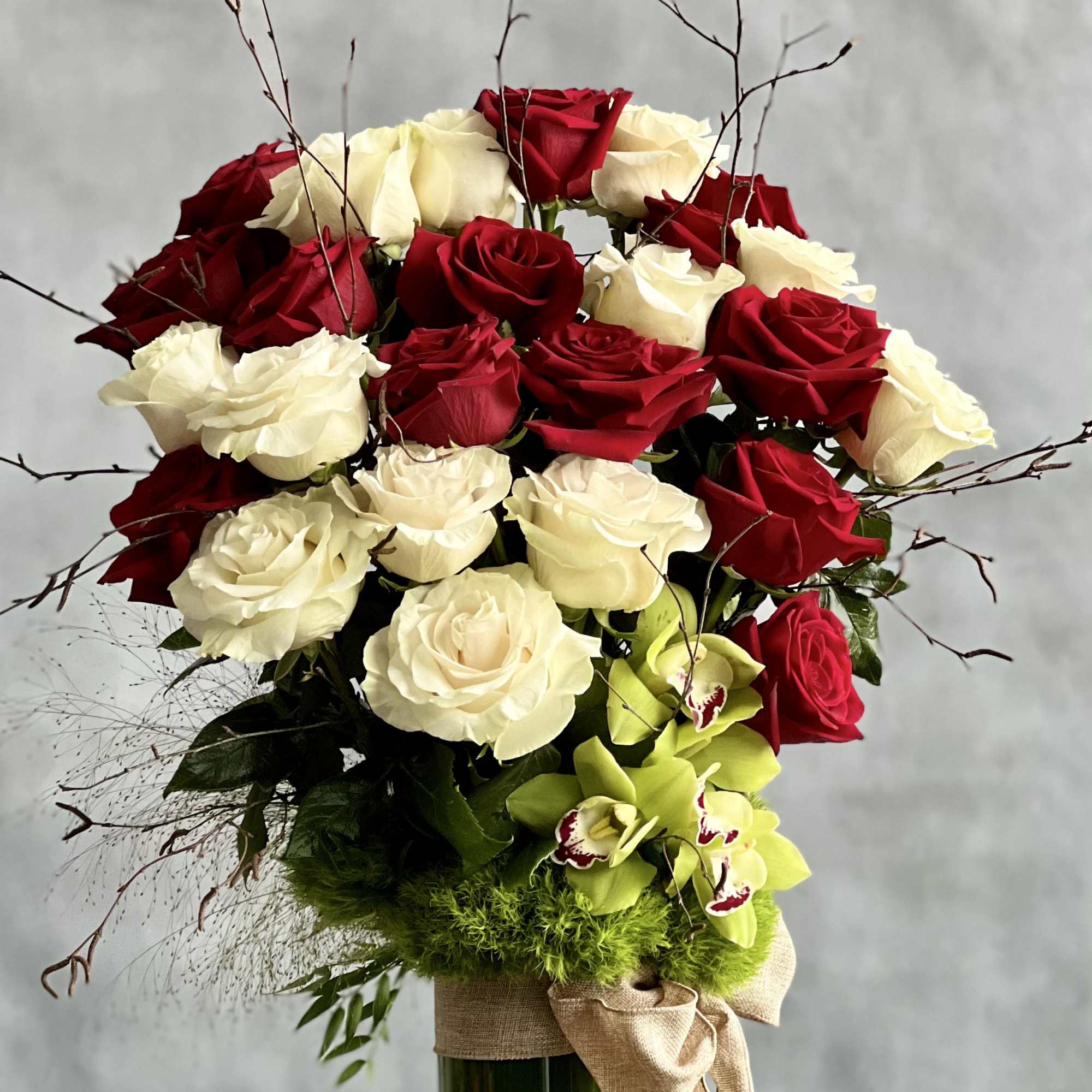 Beverly Hills Florist presents this elegant glass footed vase which holds 1